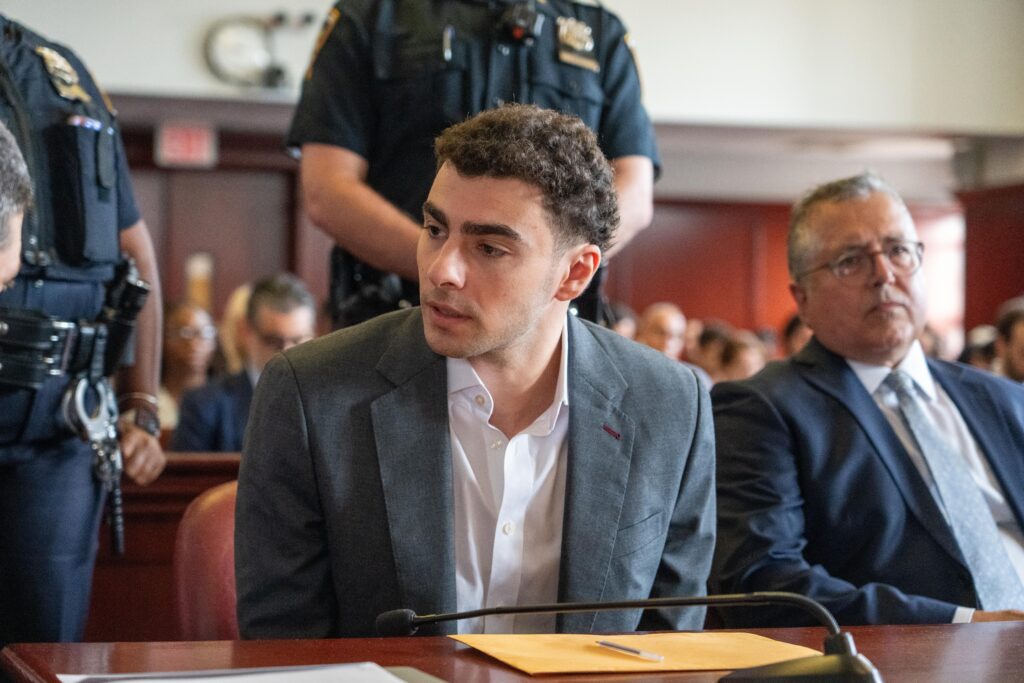 Mangione admits to shooting insurance CEO, pleads guilty to federal charges