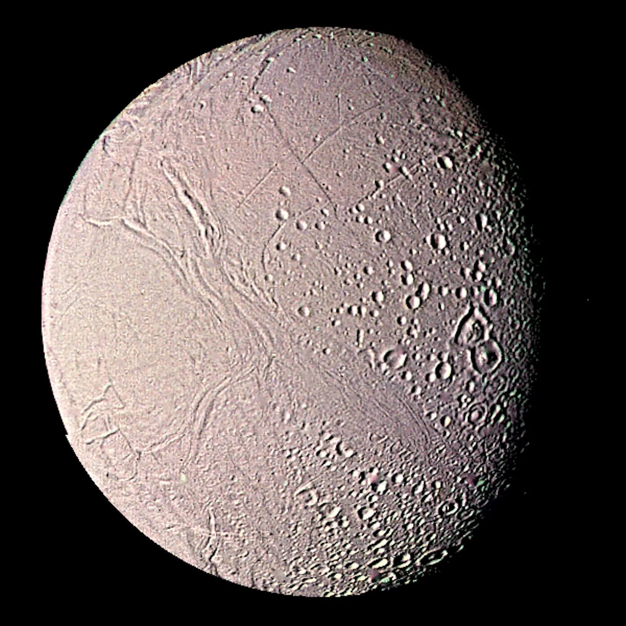 Encheladus, Saturn's moon, seen in unprecedented detail by Voyager.