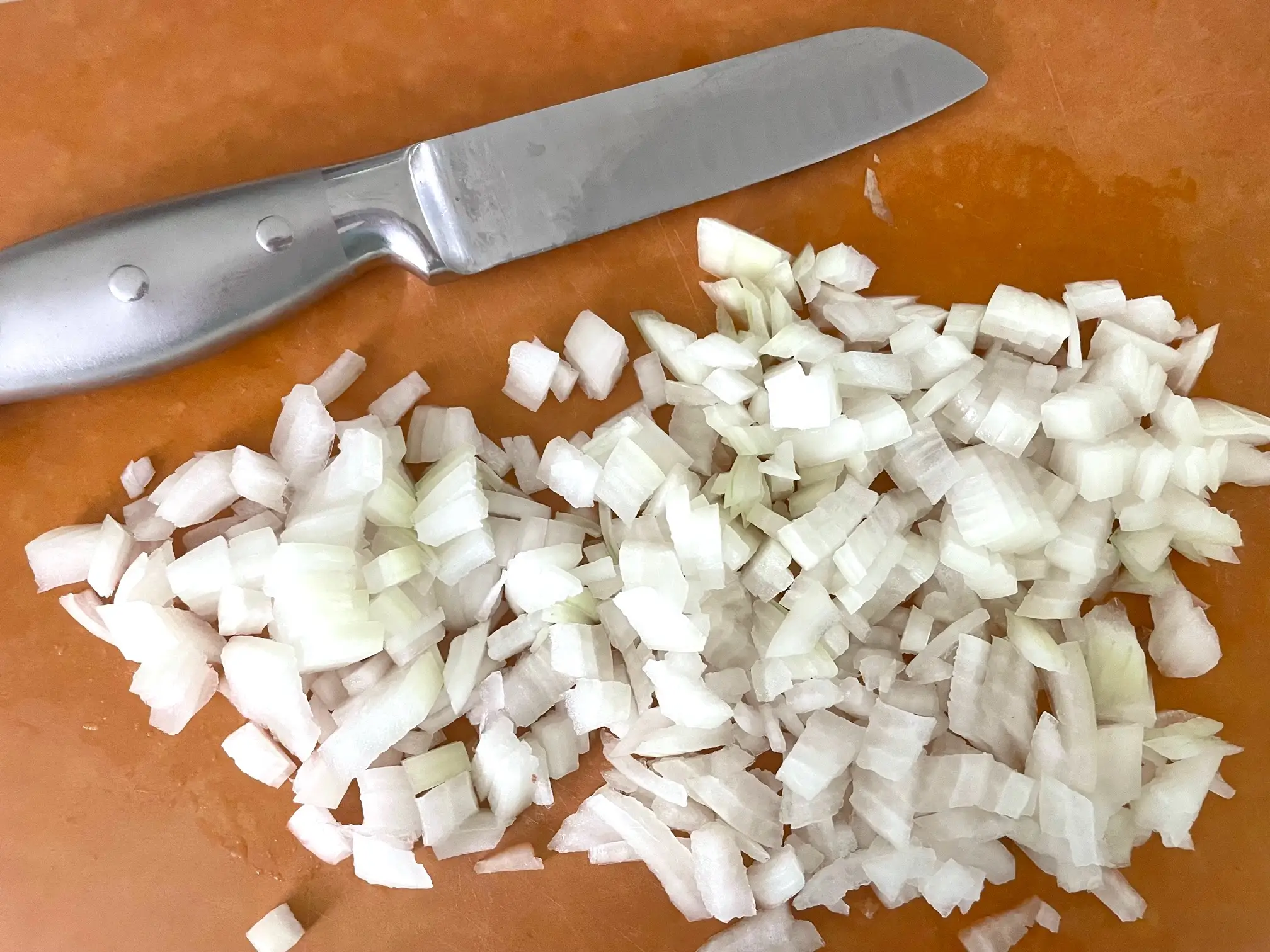 Chopping onions for Ina Garten's Penne Alla Vodka