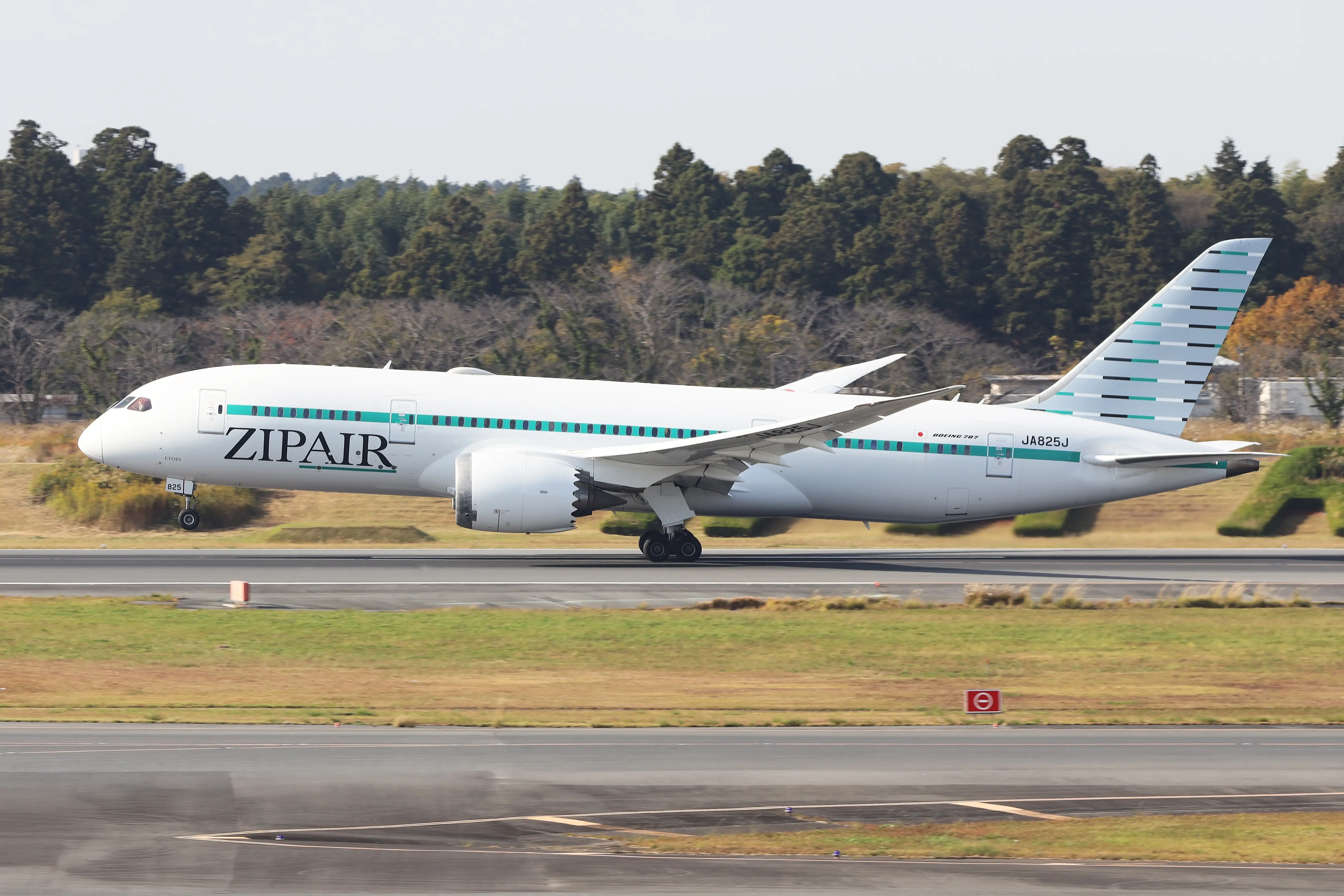 ZipAir Boeing 787-8 takes off from Tokyo Narita International Airport.