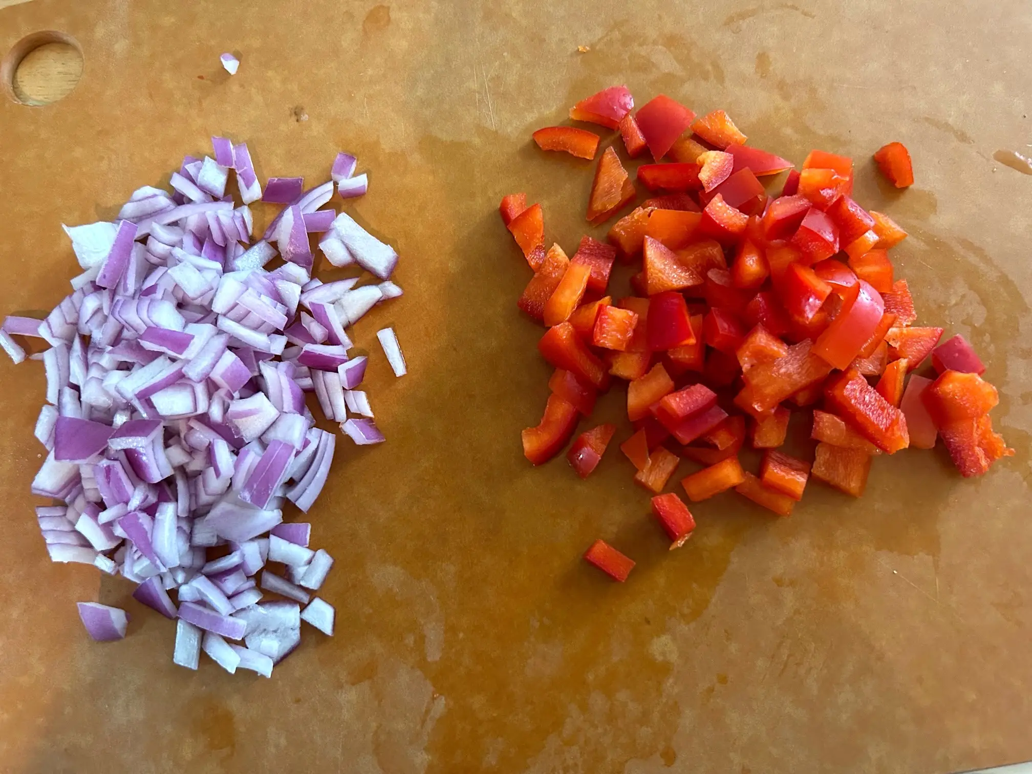 Chopping veggies for Ina Garten's Greek Orzo Salad