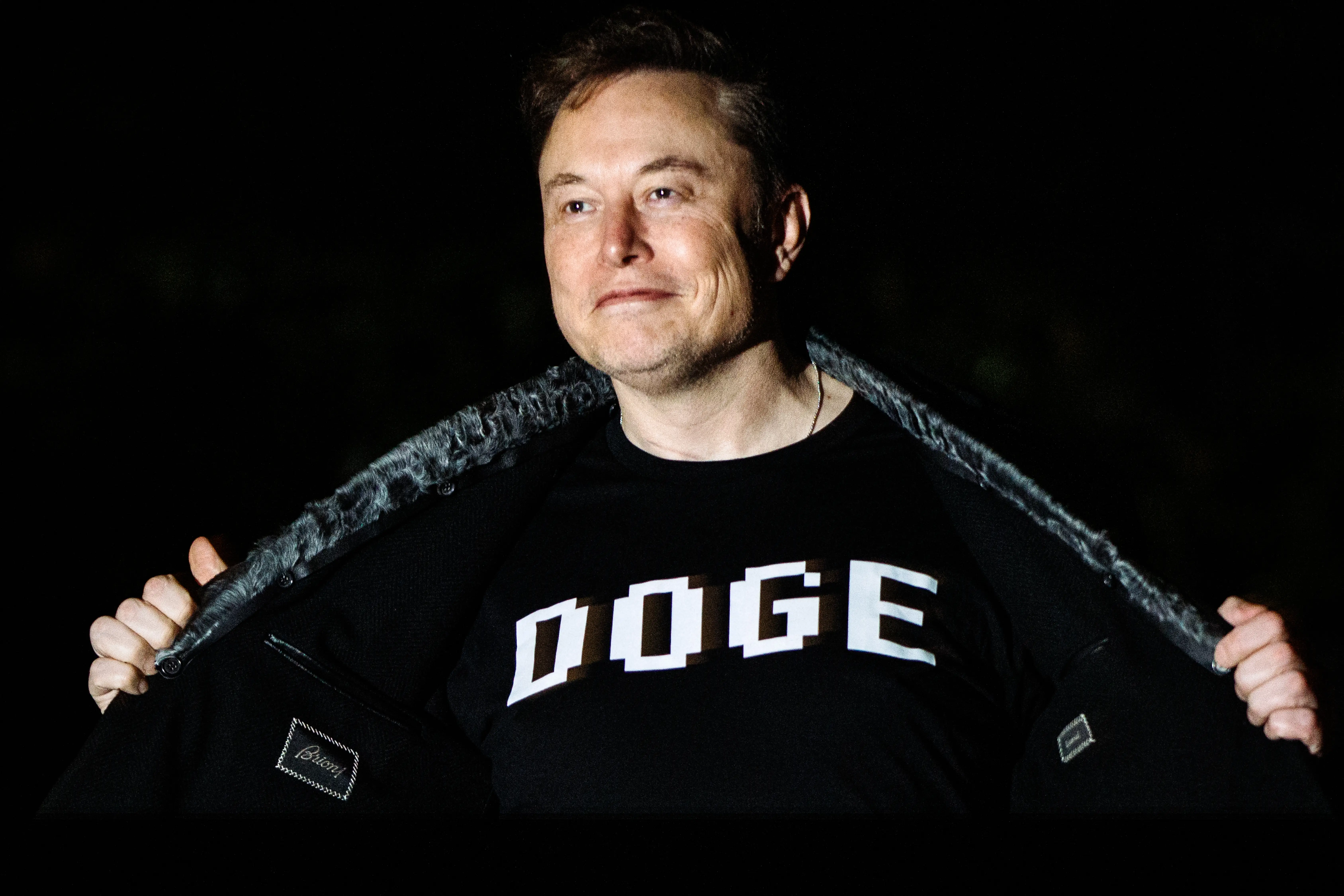 Elon Musk in a DOGE shirt
