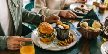 4 things you should never order in front of your boss or coworkers, according to an etiquette expert