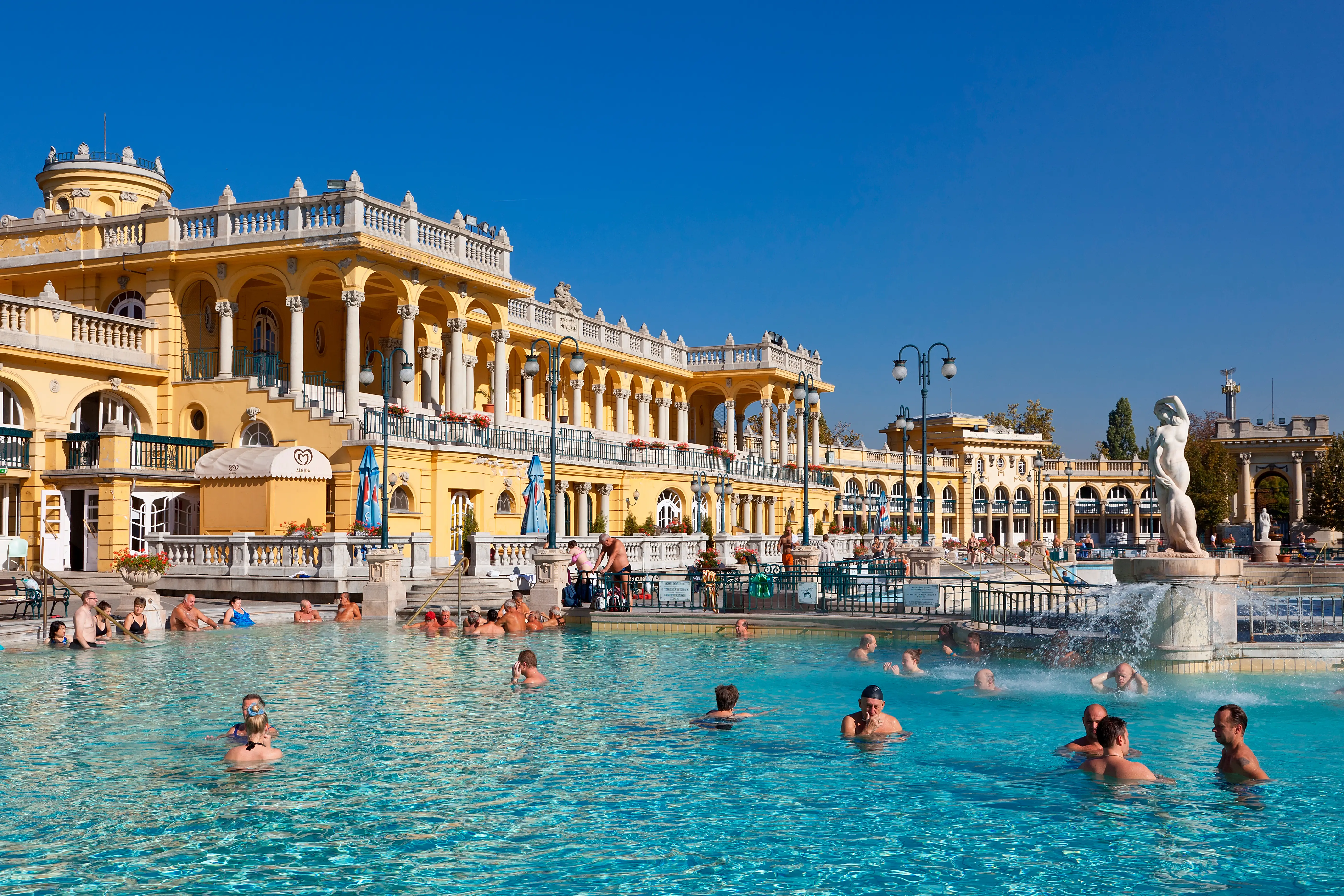People in the outdoor pool of the Széchenyi baths in Budapest.