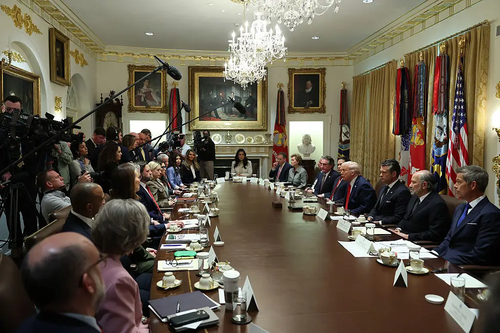 The Cabinet Room with new gold furnishings added by Donald Trump.