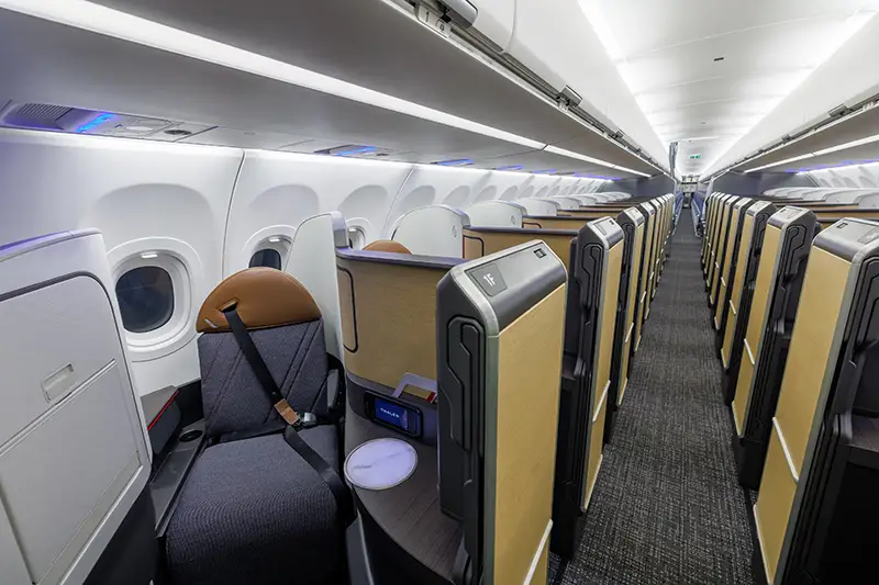 Looking down the aisle inside AA's A321XLR, business class is in front