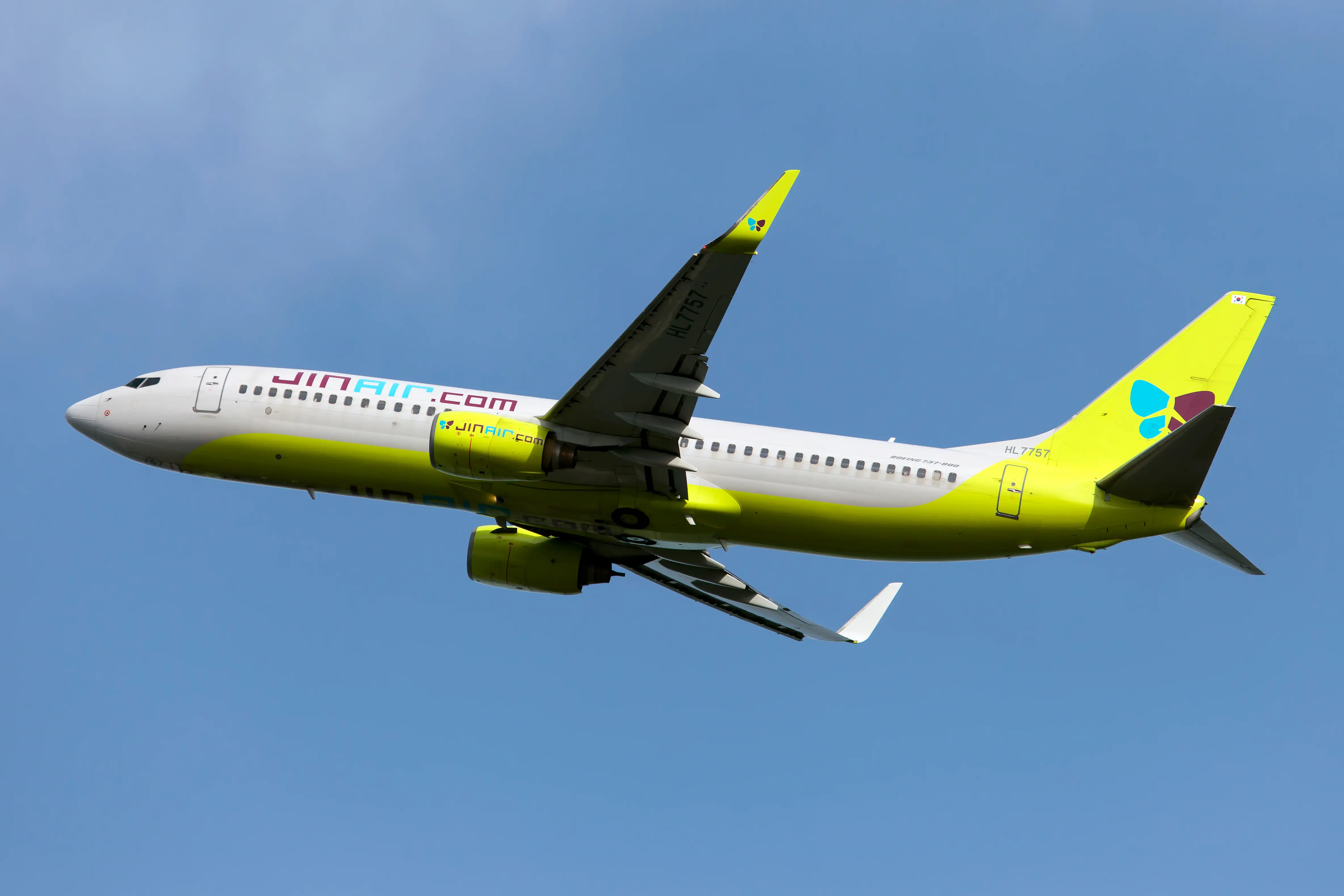 A Jin Air Boeing 737-800 taking off from Osaka - Kansai Airport.