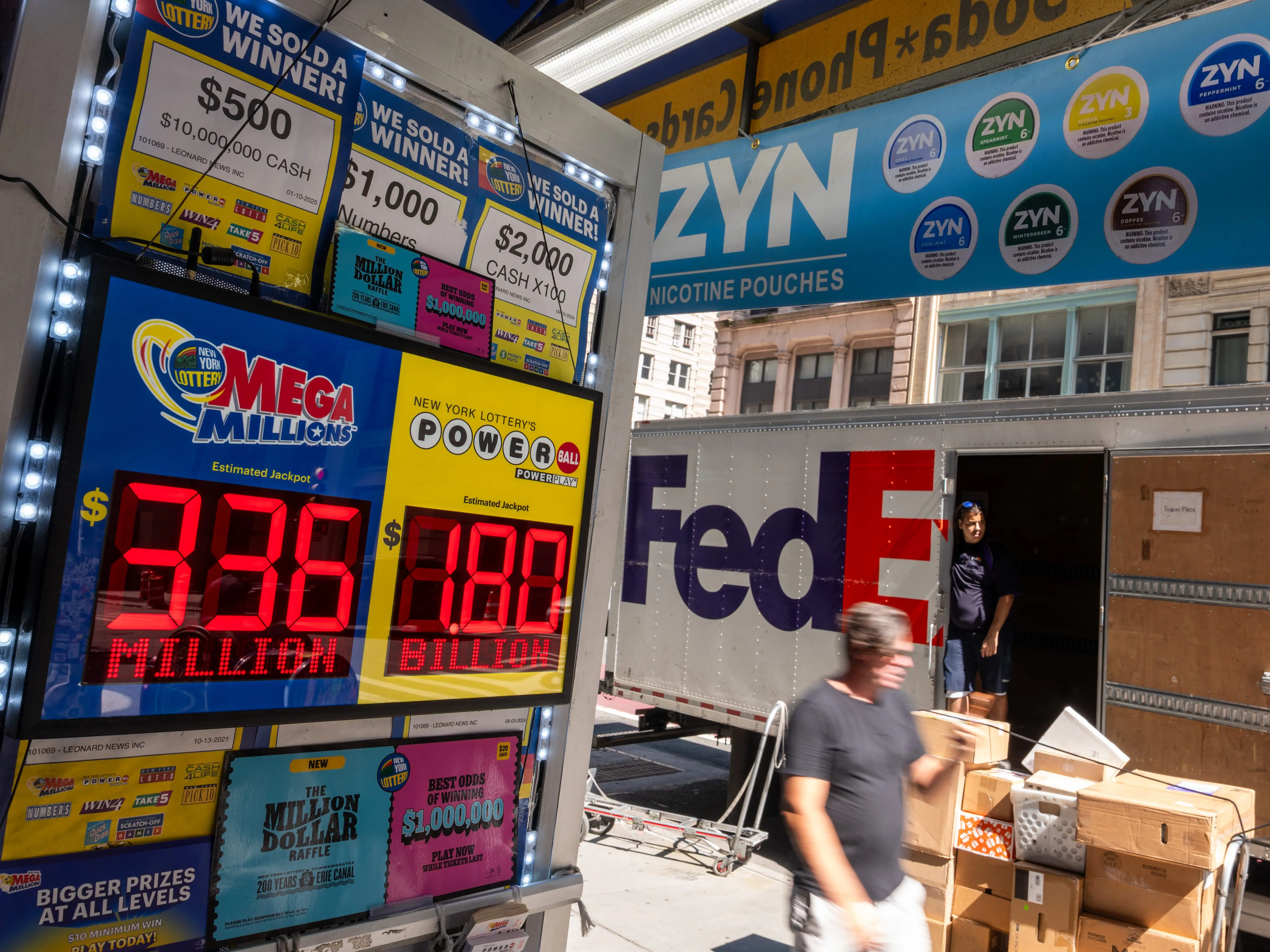A newsstand in Manhattan advertises the Powerball Jackpot, which reached $1.8 billion