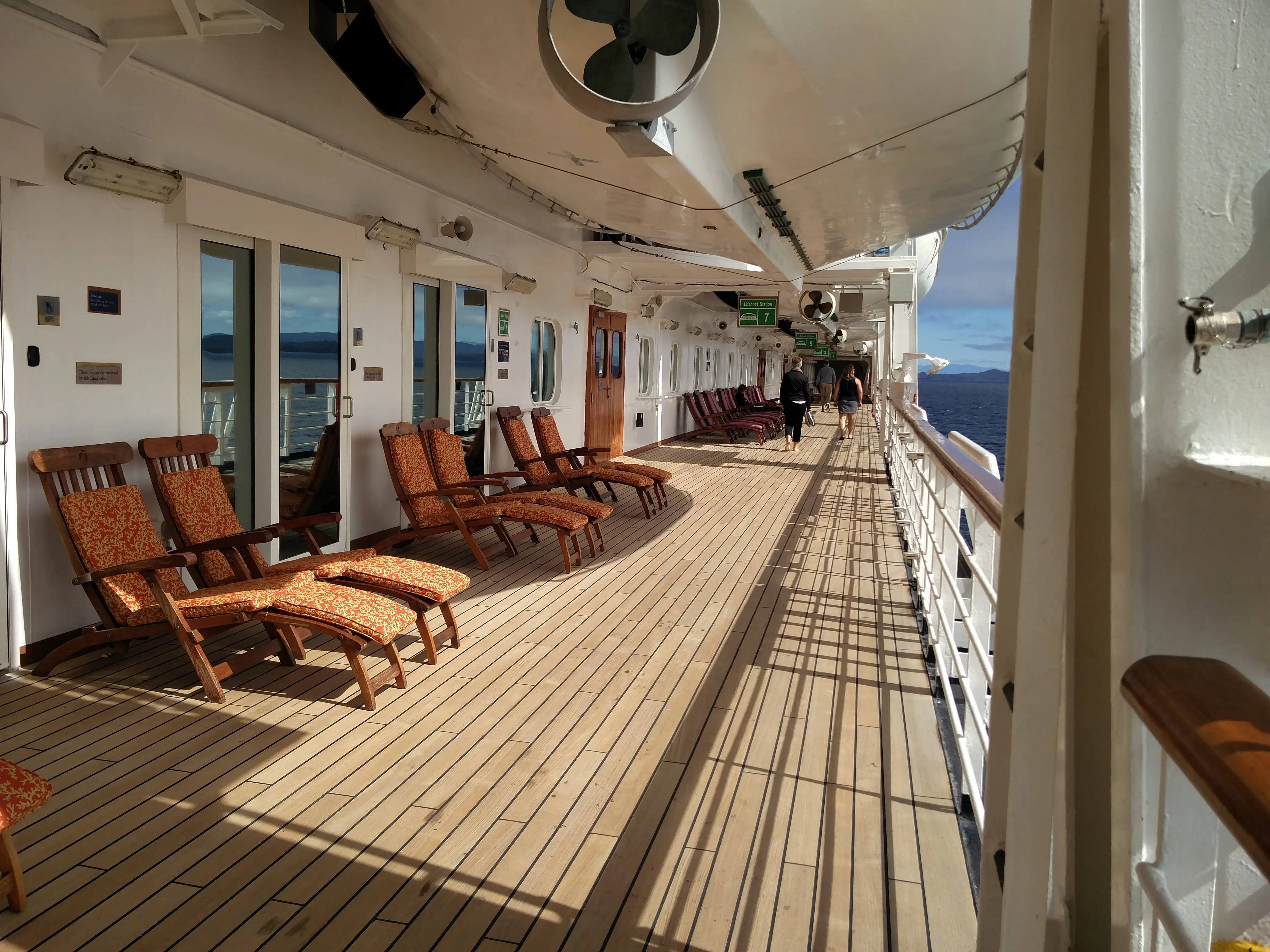 Lounge chairs on a cruise deck.