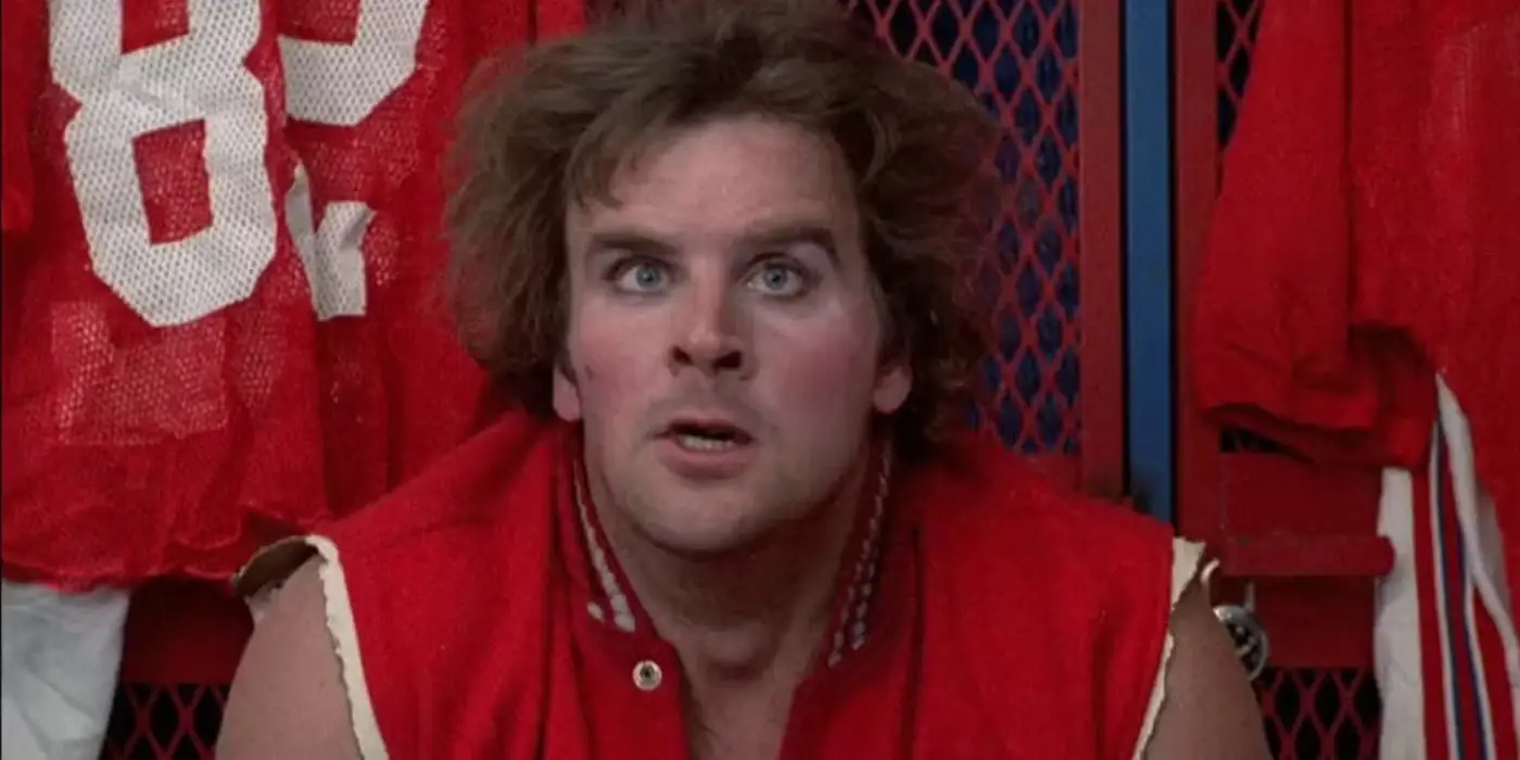Donald Gibb in a football jacket in Revenge of the Nerds movie