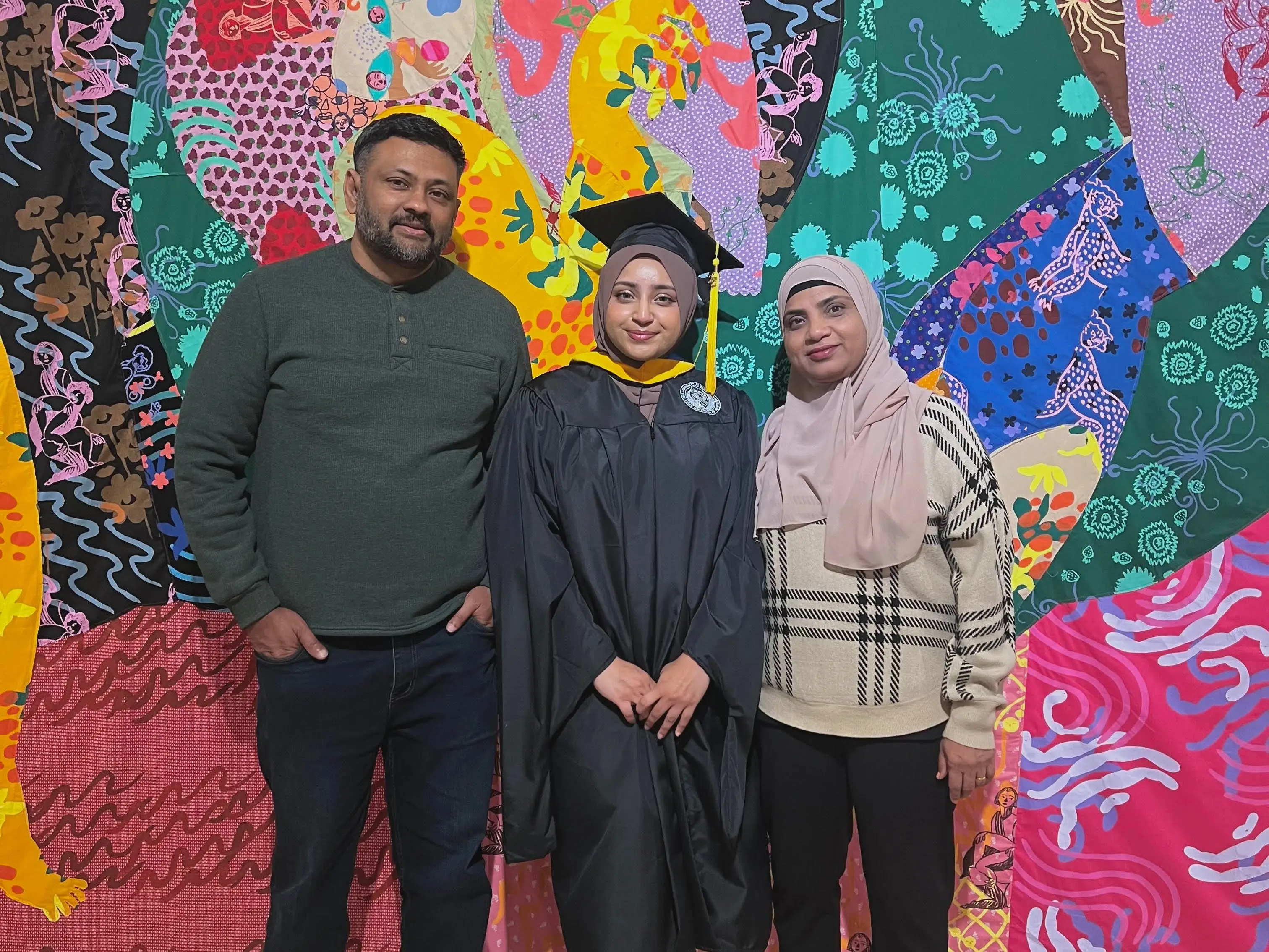 Eeman Farooqui with her parents.