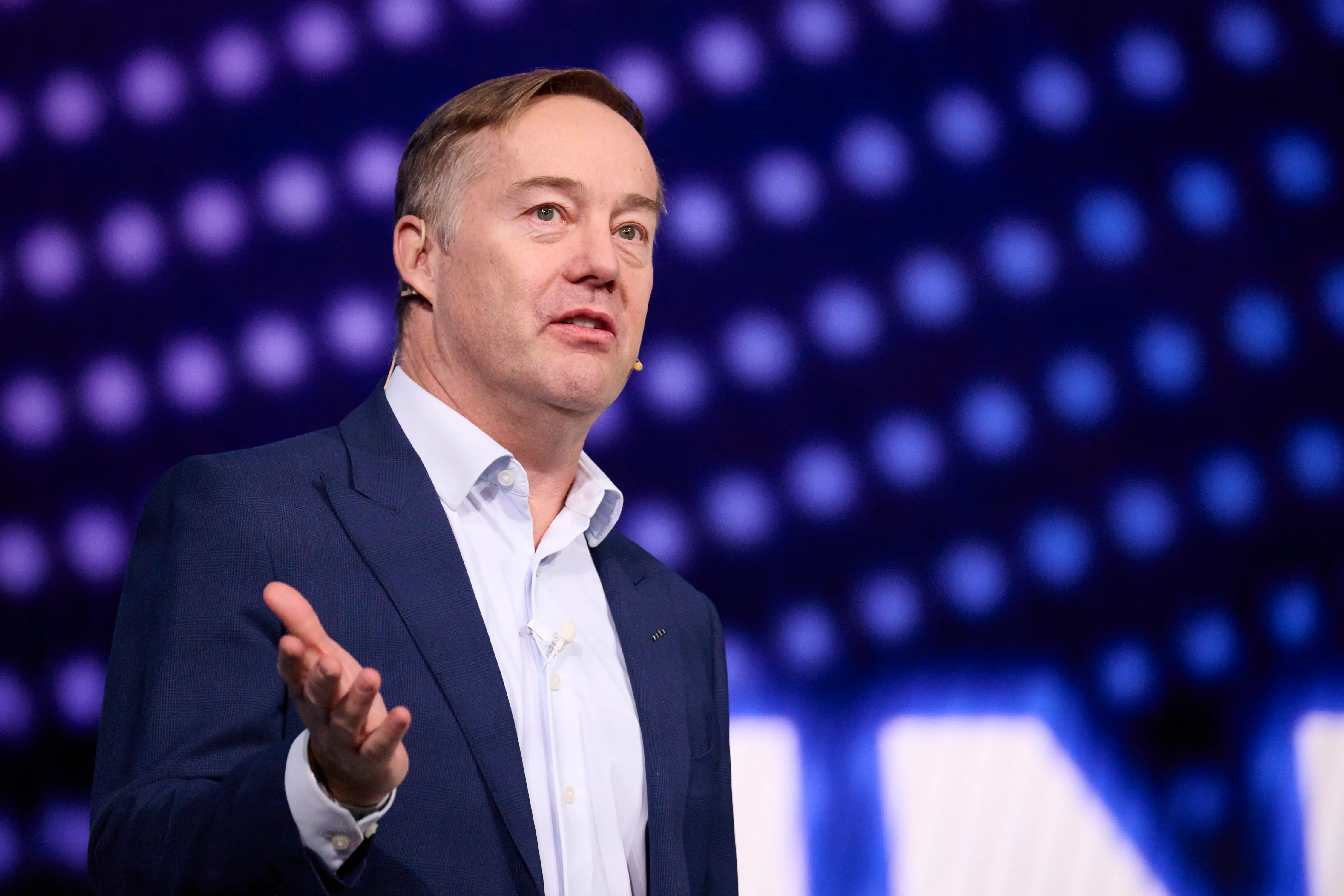 jason calacanis gestures on a stage