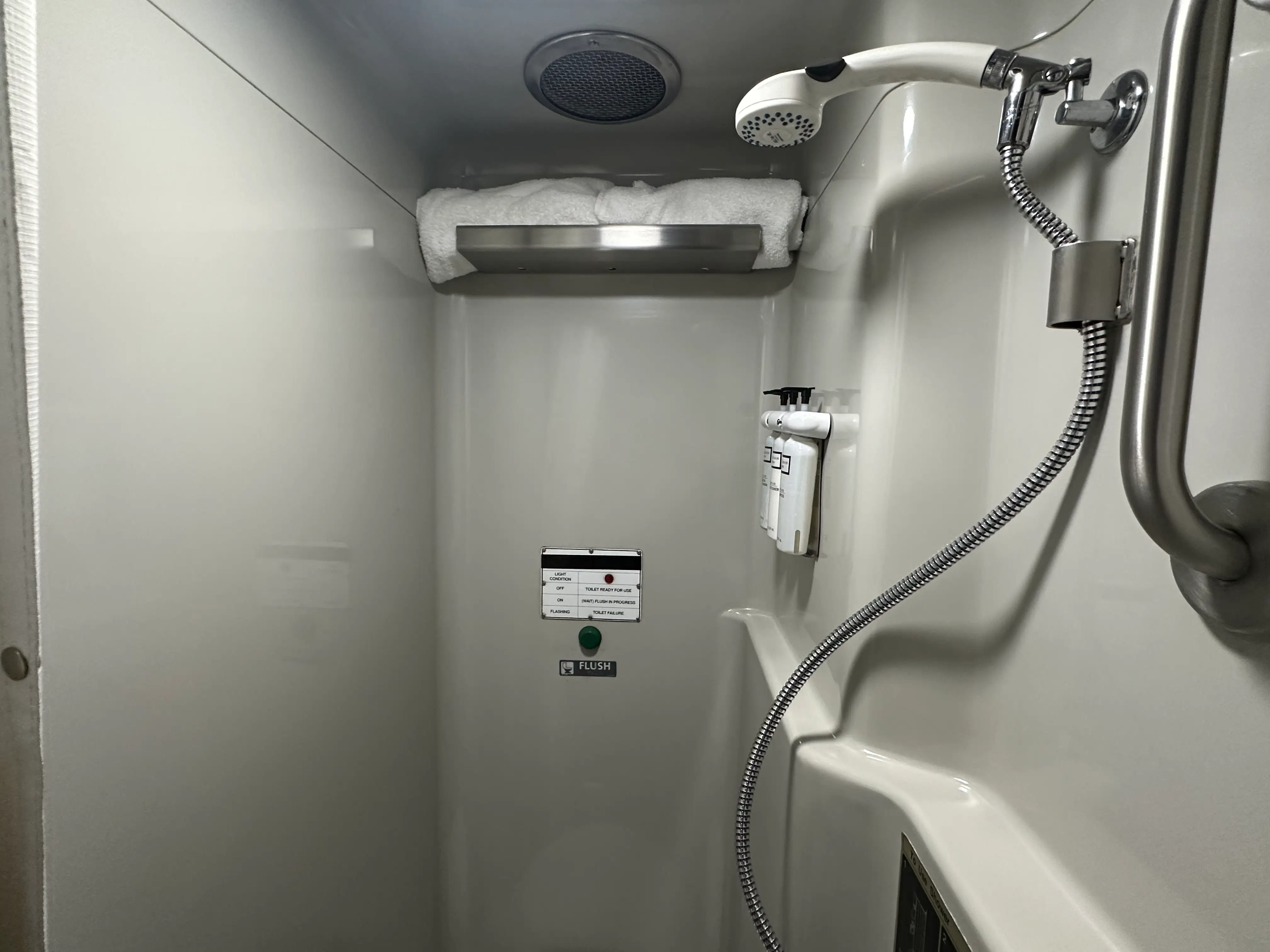Shower area with towels on high rack in private room on  Amtrak Auto Train