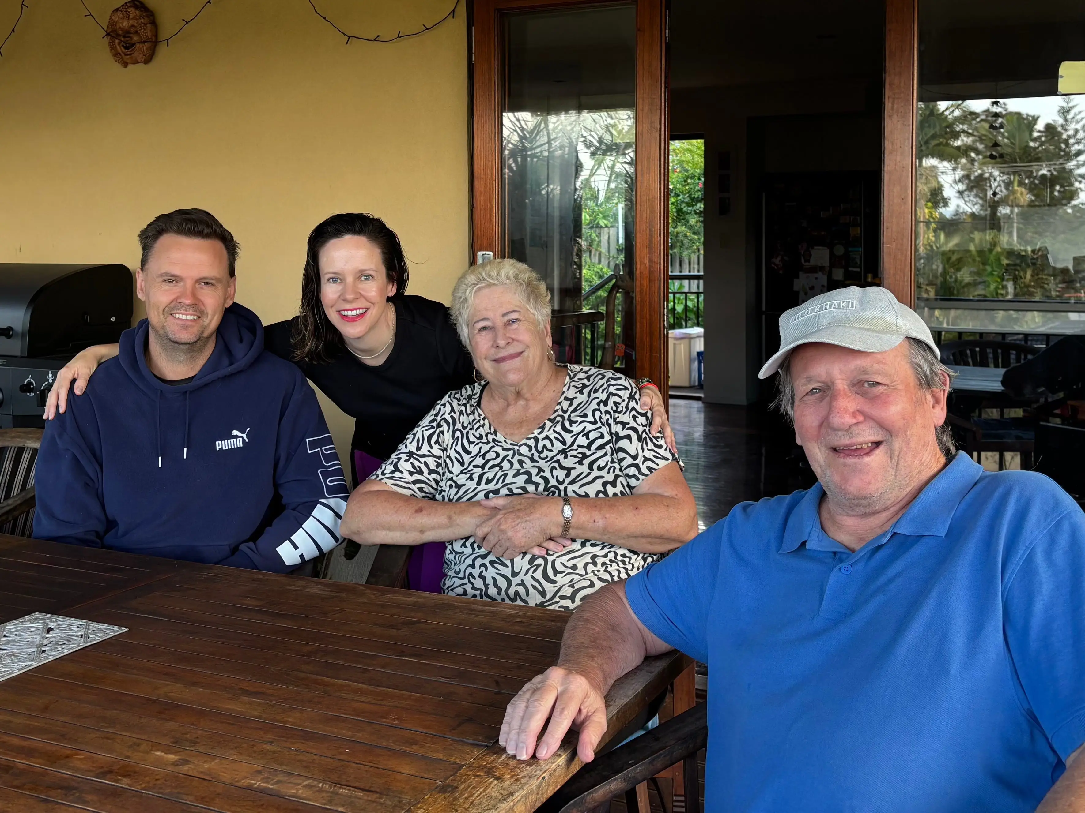The author with her husband and parents.
