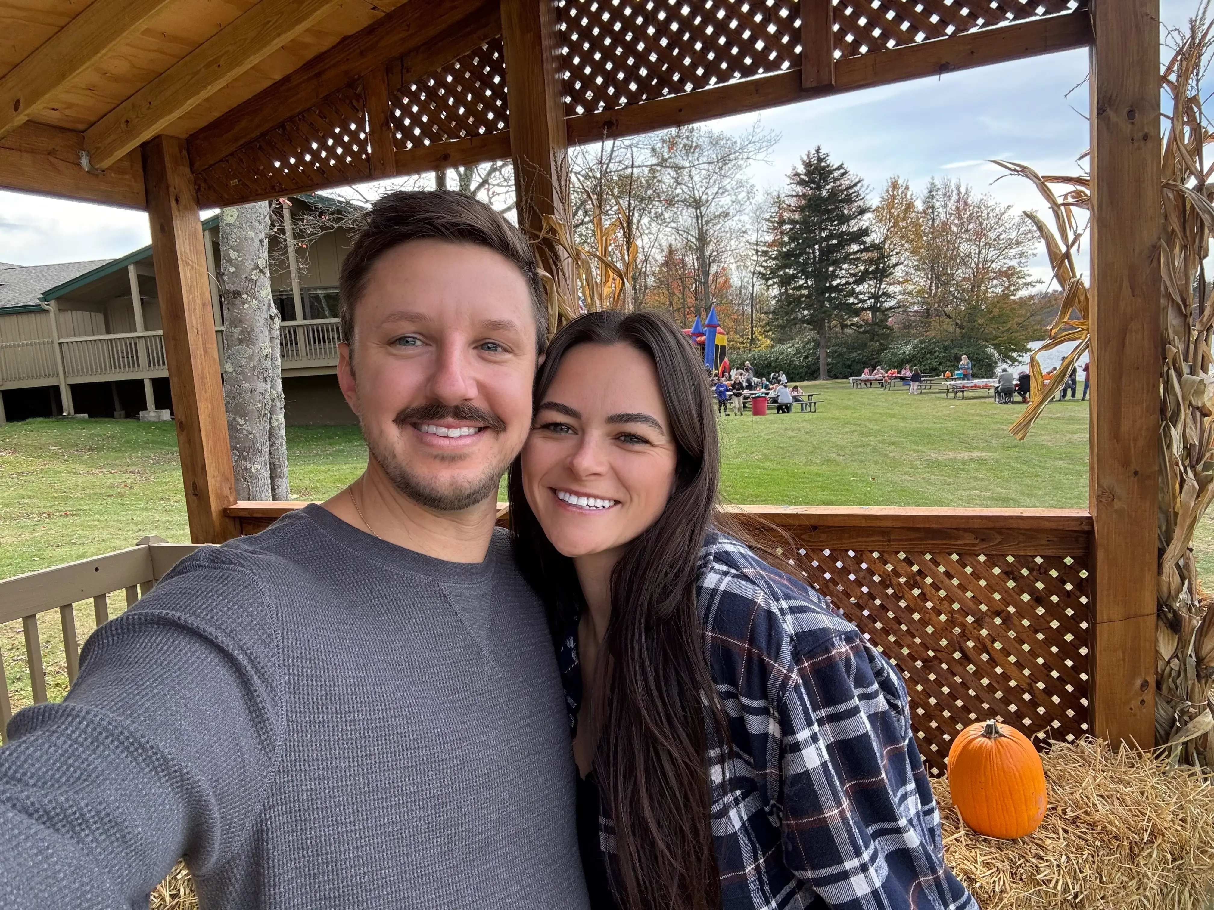 Man and woman smiling outdoors