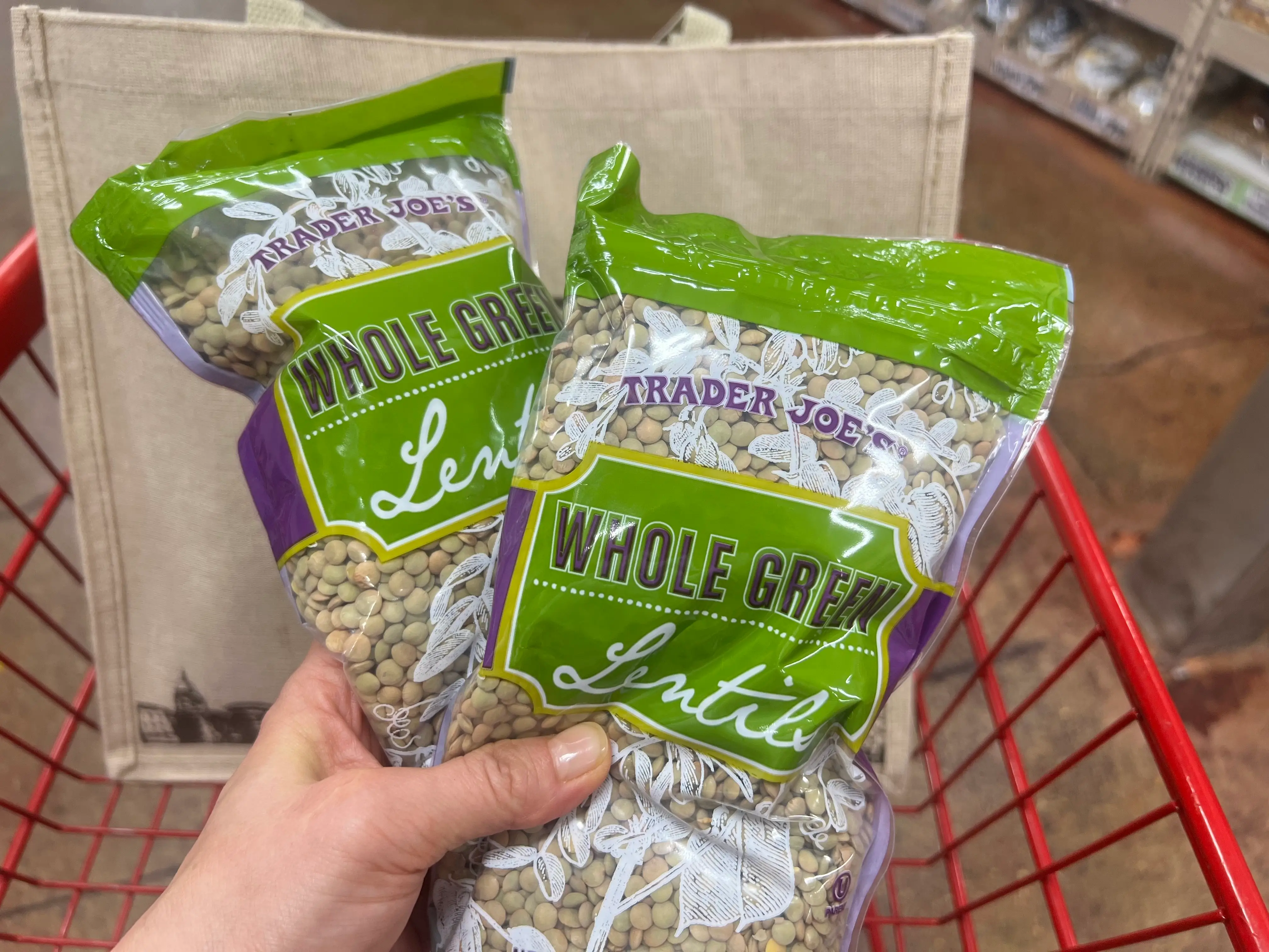 Hand holding Trader Joe's lentils