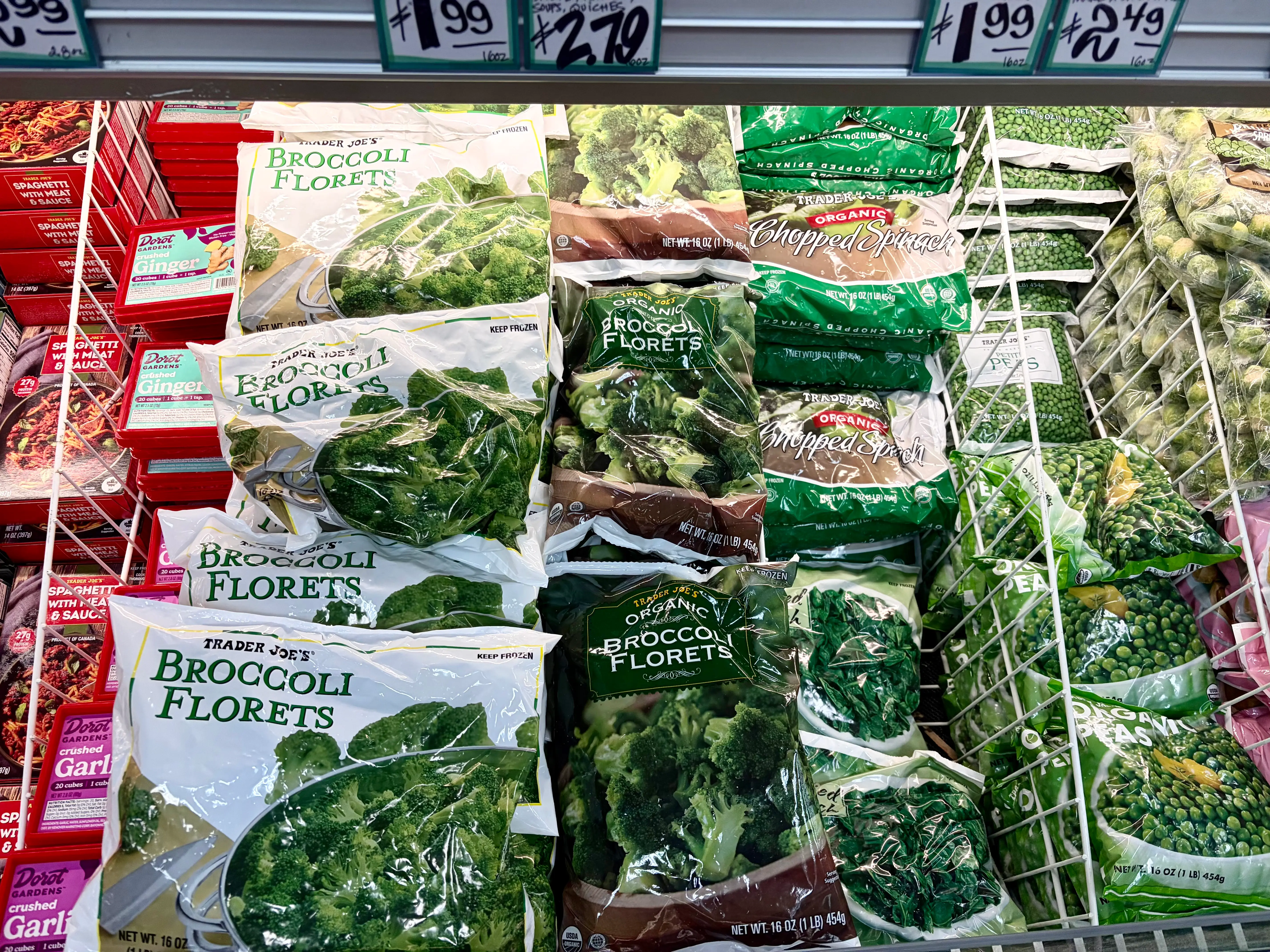 Bags of frozen broccoli florets at Trader Joe's.
