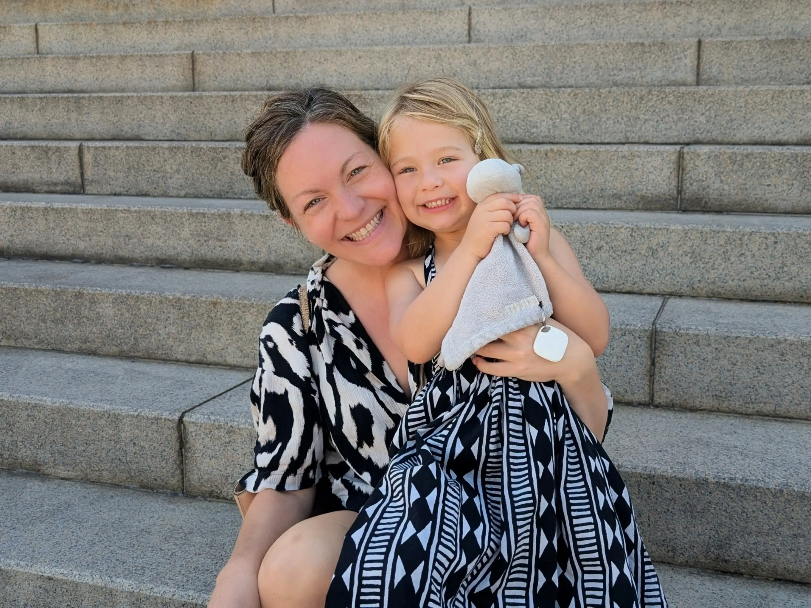 Mom and toddler posing for photo