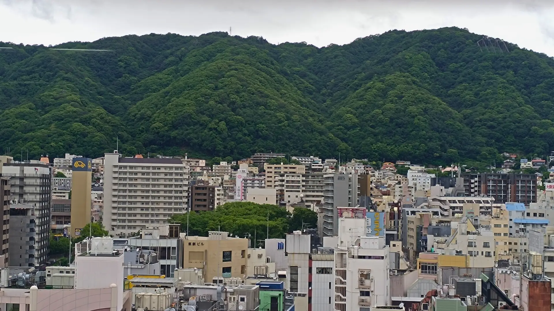 Aerial view of buildings, trees in Kobe City, Japan