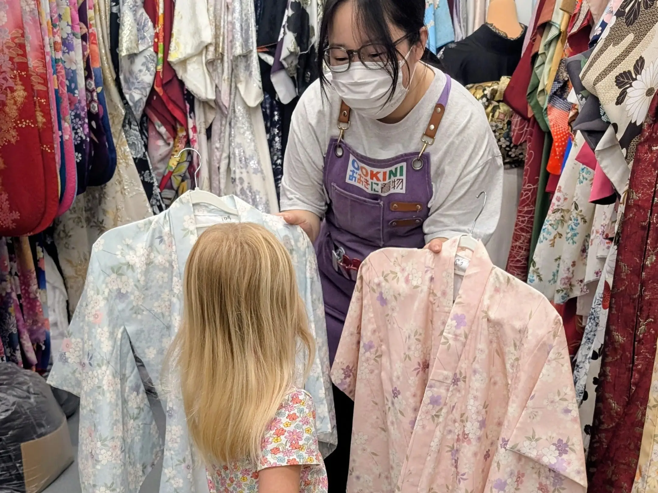 Girl choosing kimonos
