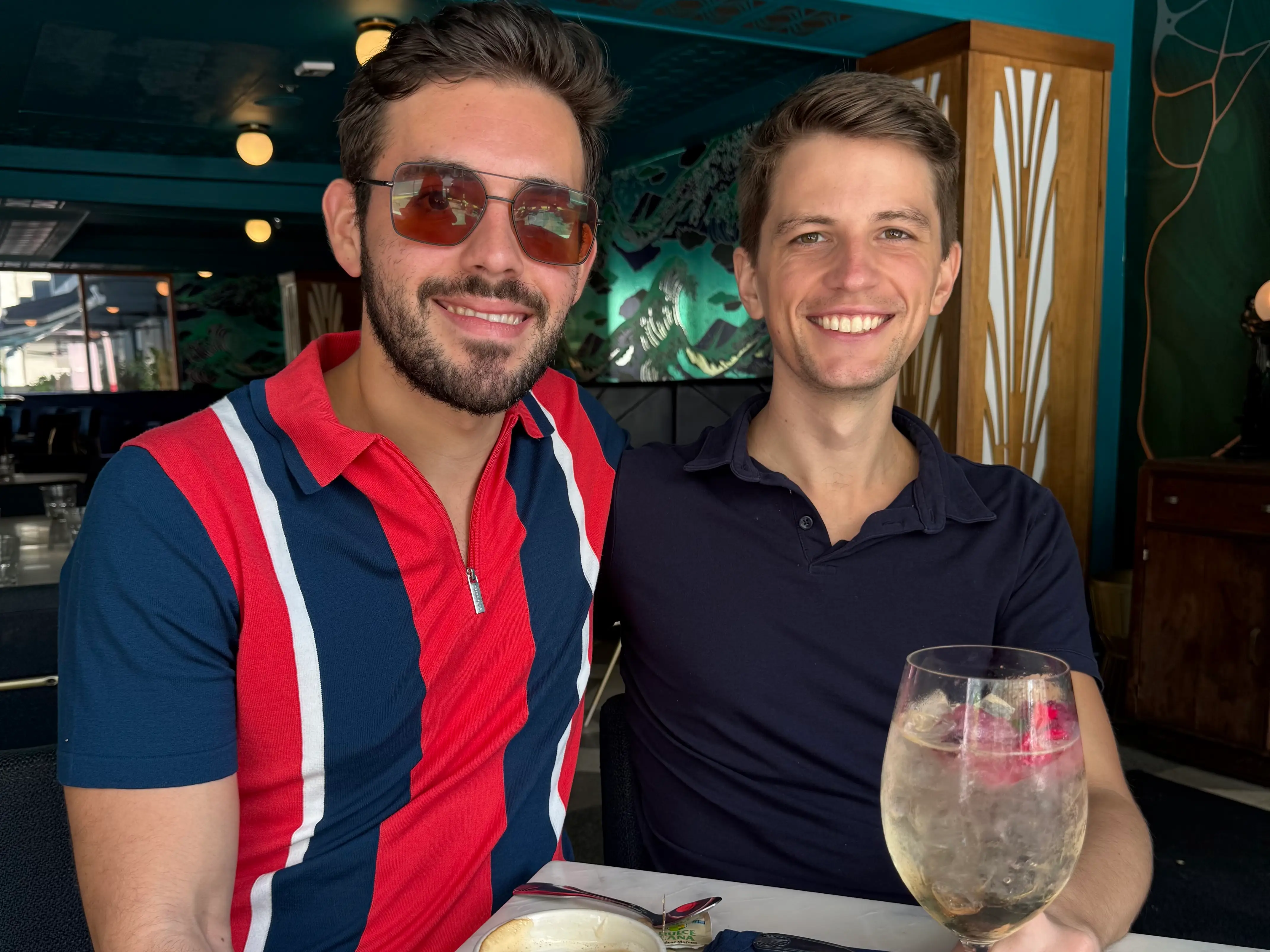 Two men smiling together