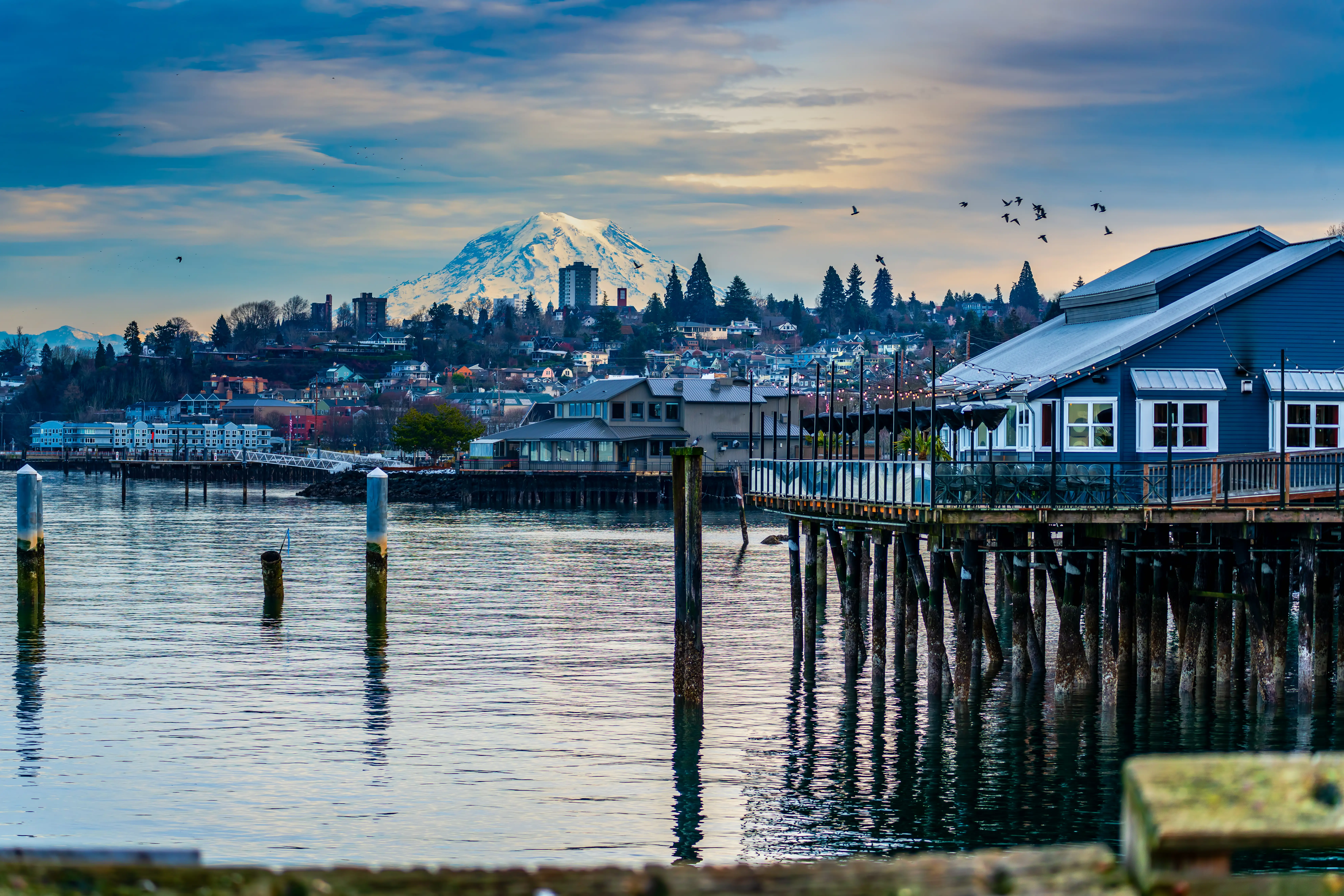 A view of buildings in Tacoma, Washington, with Mount Rainier behind.