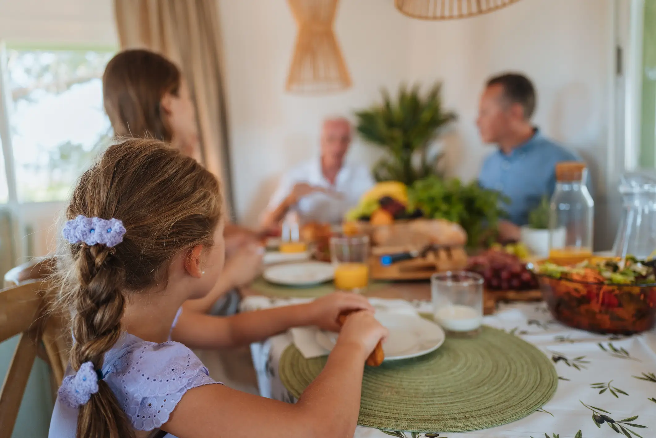 Family eating breakfast at table