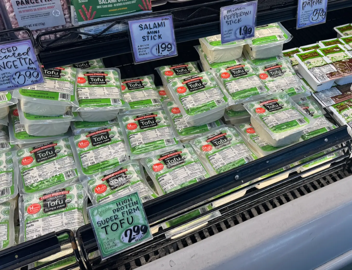 Packets of organic super-firm tofu from Trader Joe's.