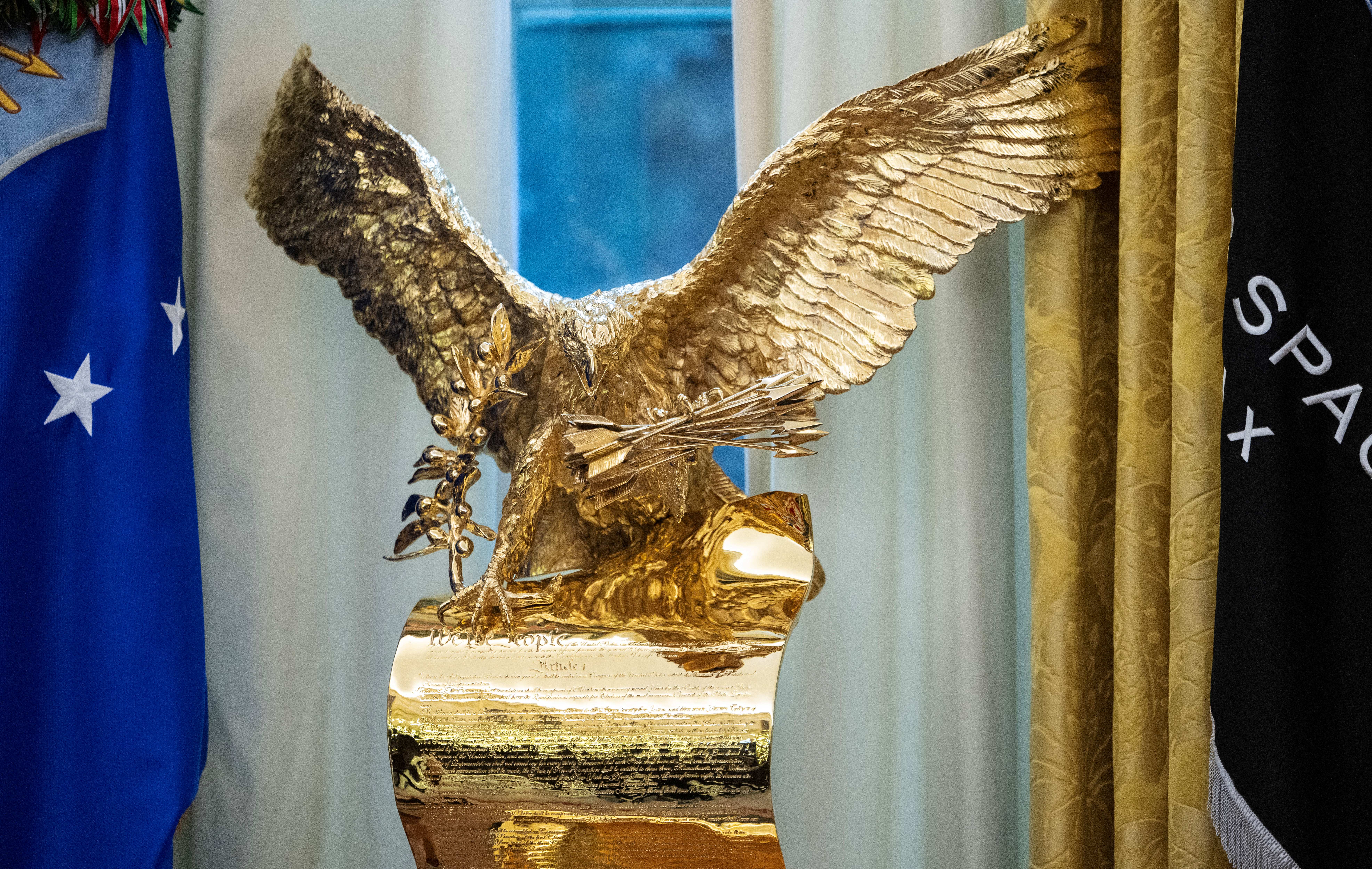 The Presidential American Patriot sculpture by artist Lorenzo Ghiglieri is seen in the Oval Office.