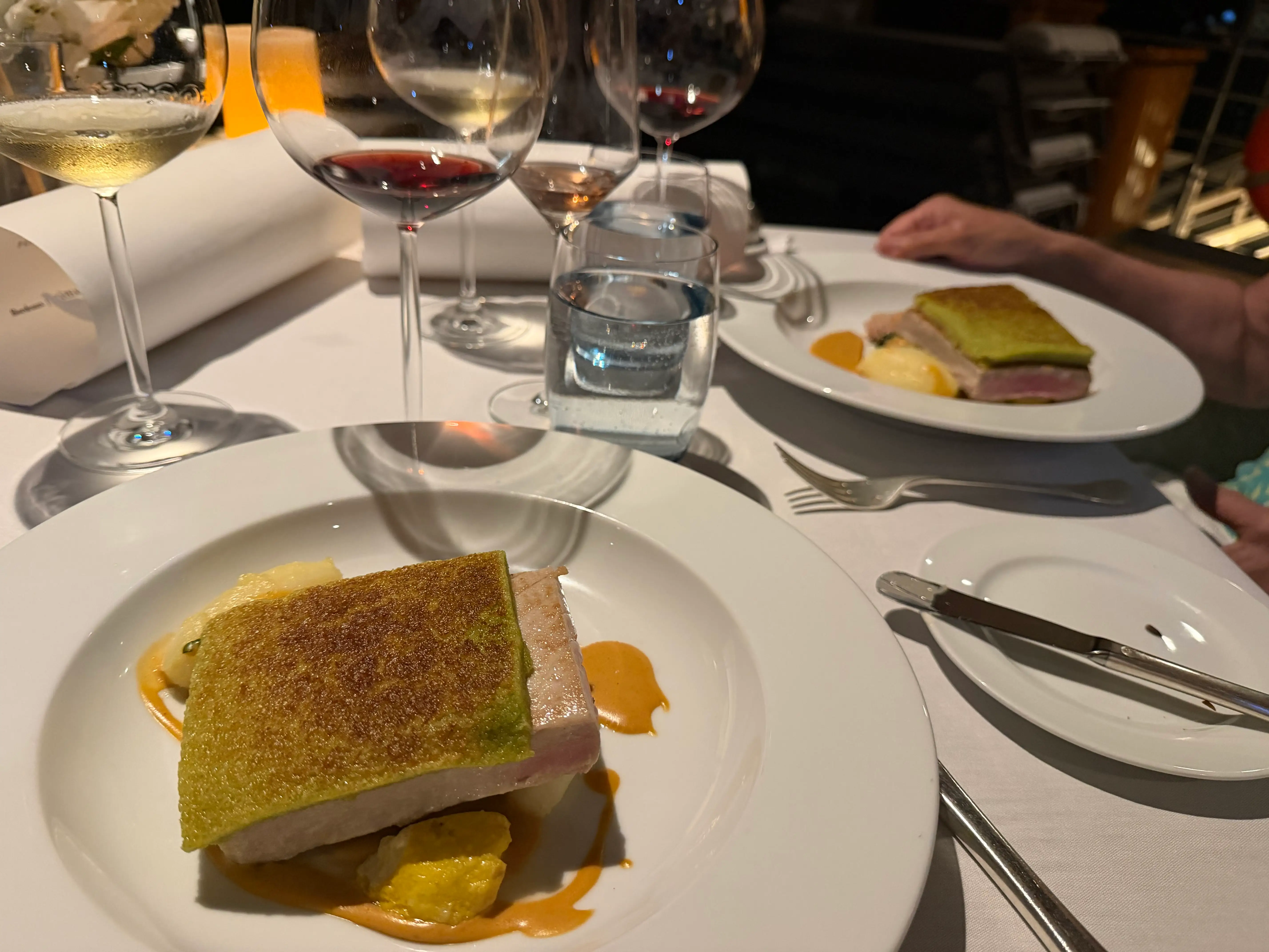 Meal with wine, water on cruise ship