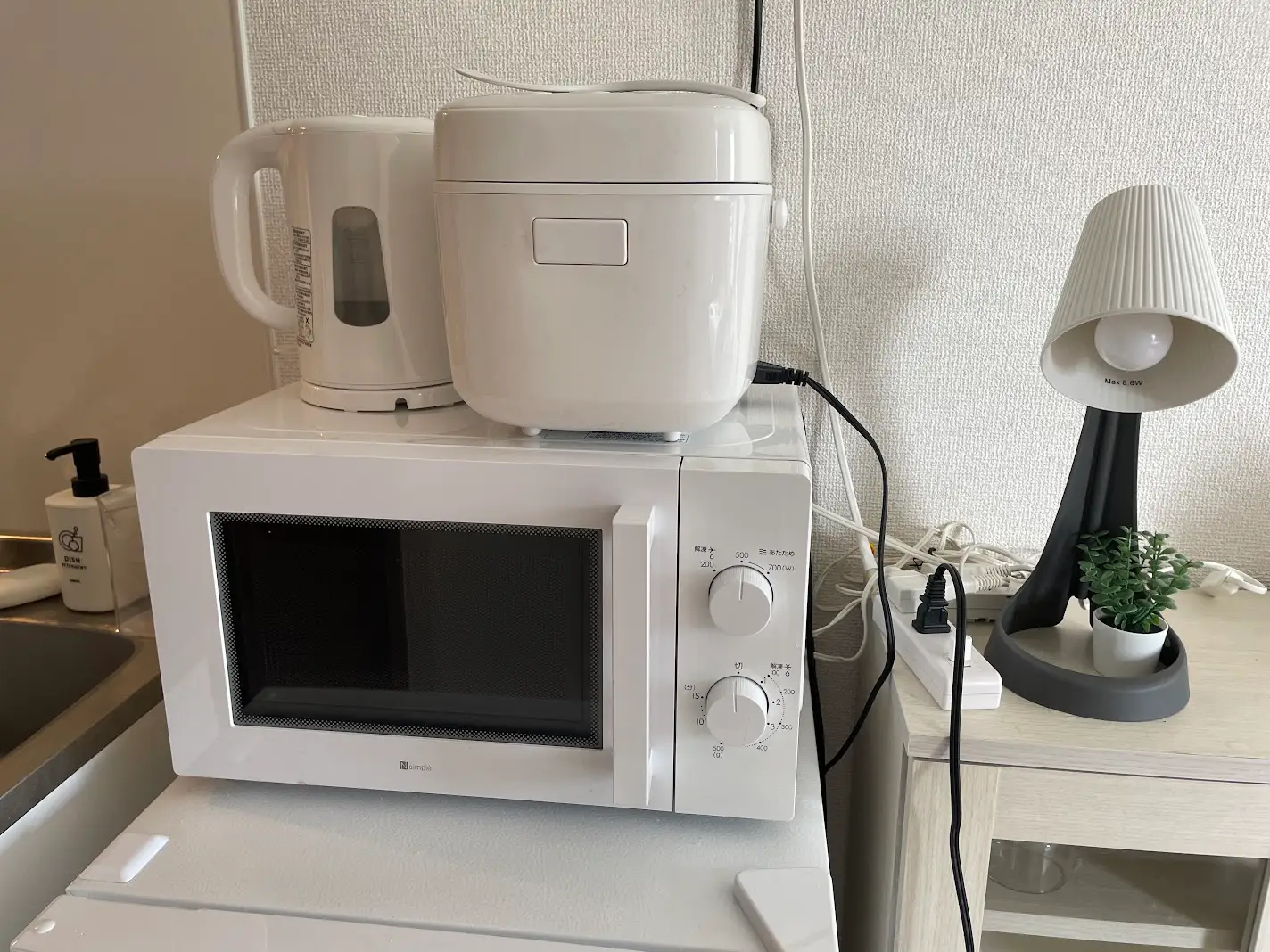 Microwave with rice cooker, kettle on top