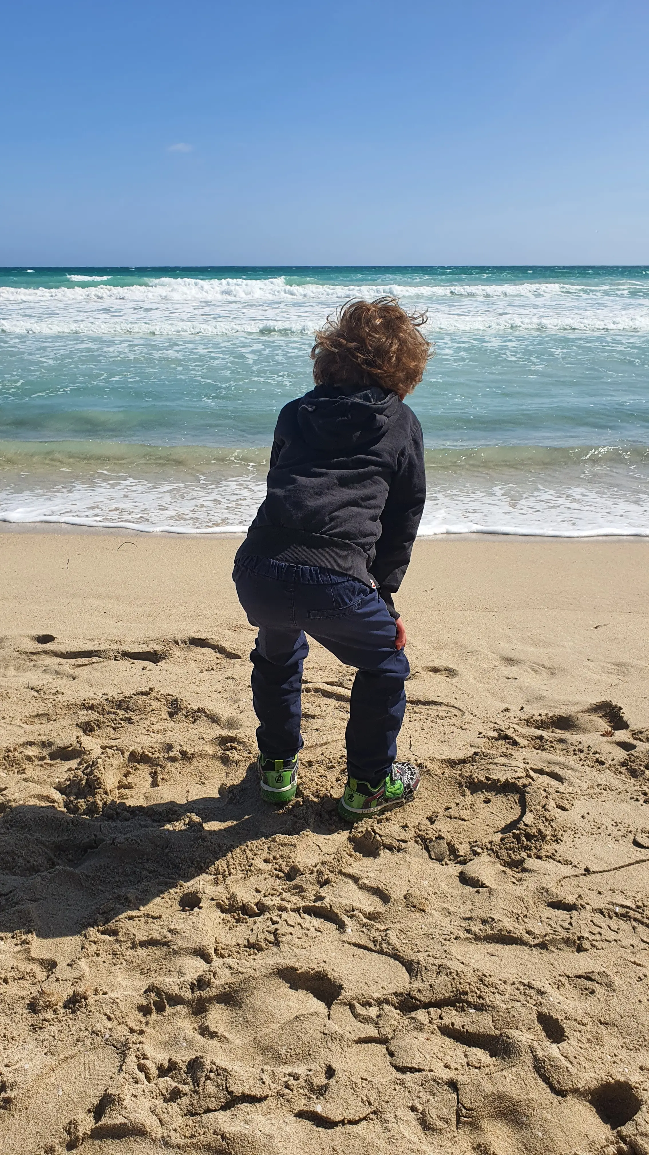 A child on a beach in Mallorca.