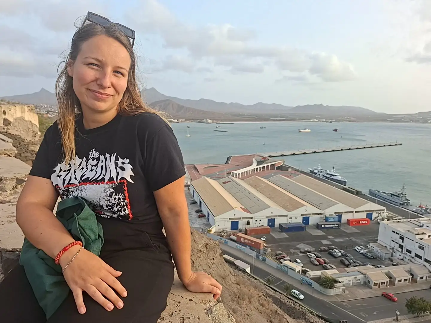 The author poses on a cliff.