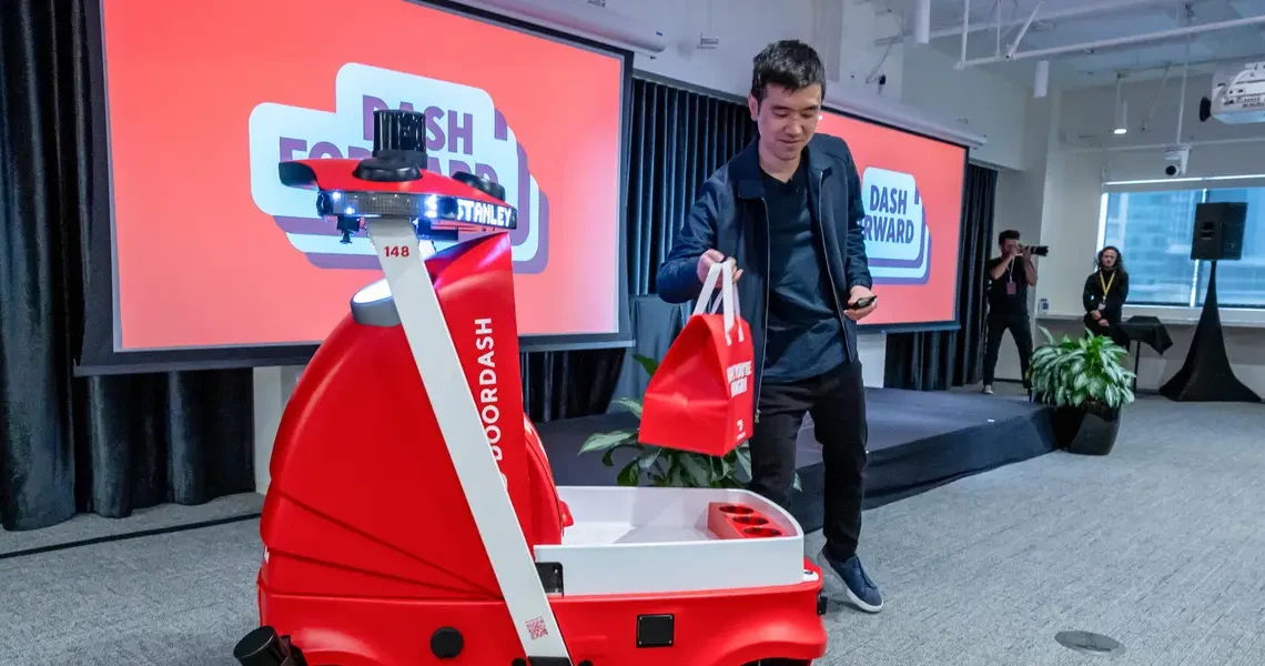 DoorDash is paying people to load its delivery robots. It points to a shortcoming of automation