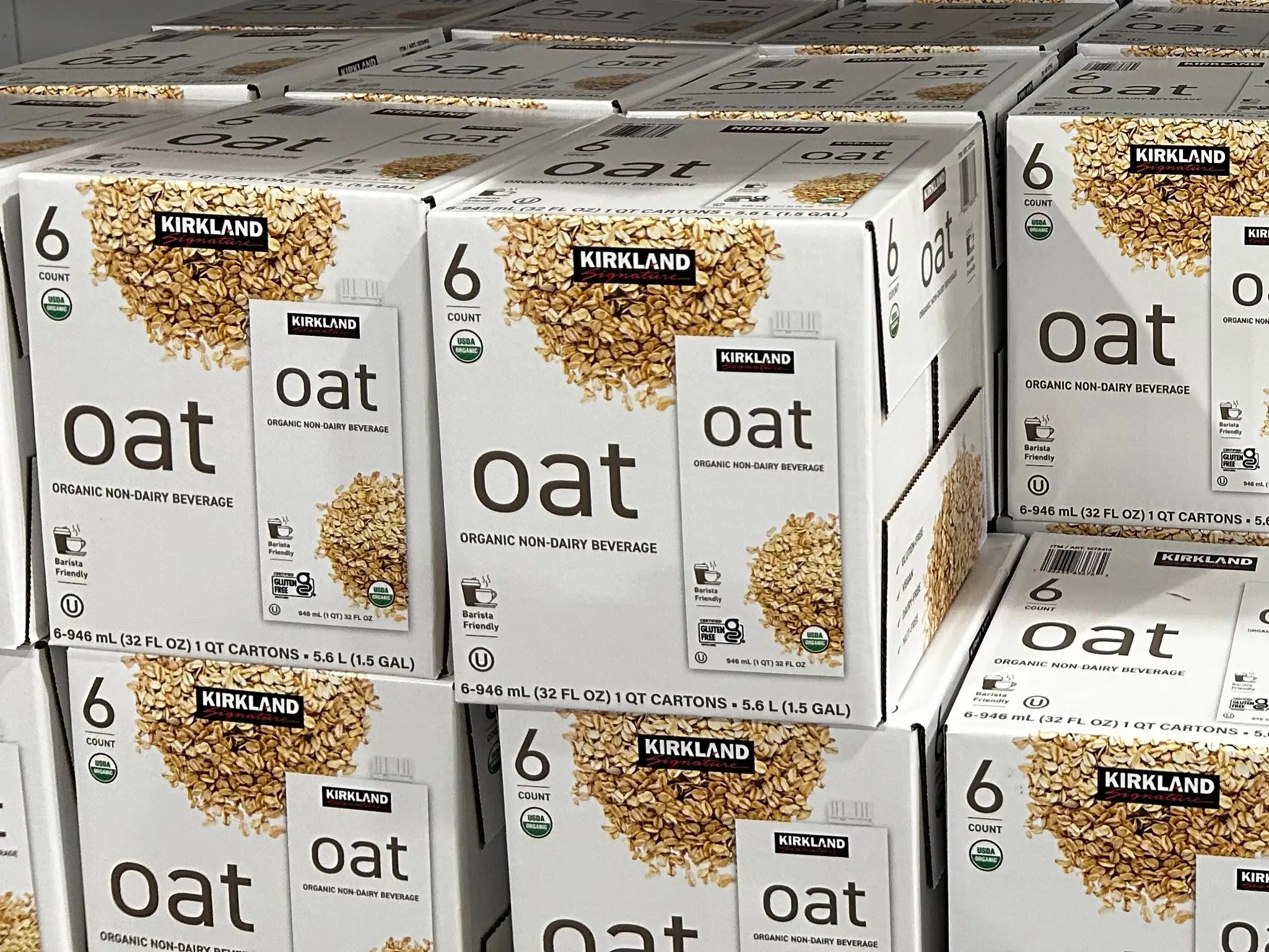 Boxes of Kirkland Signature oat milk.