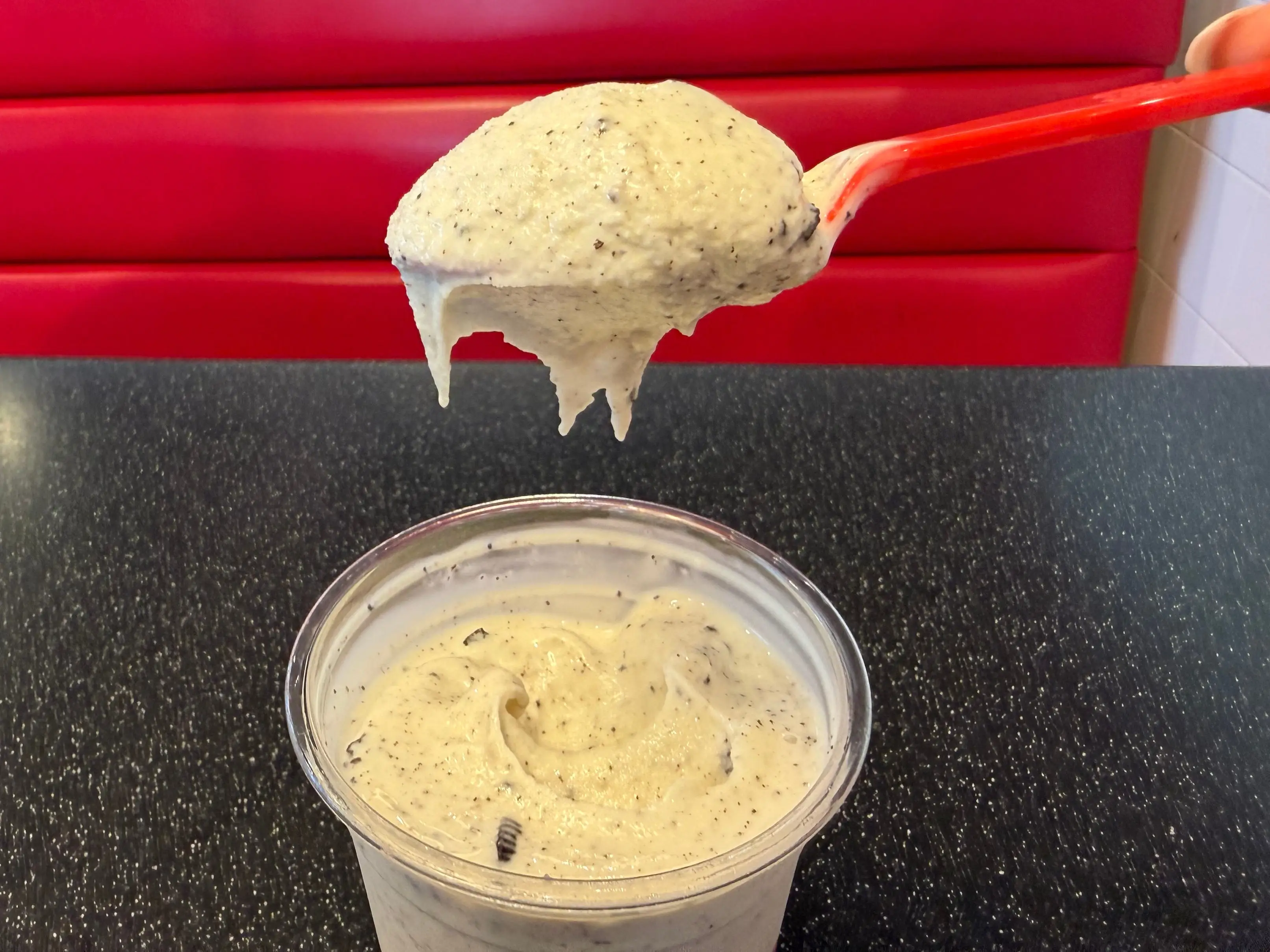 Spoon scooping oreo concrete at Freddy's