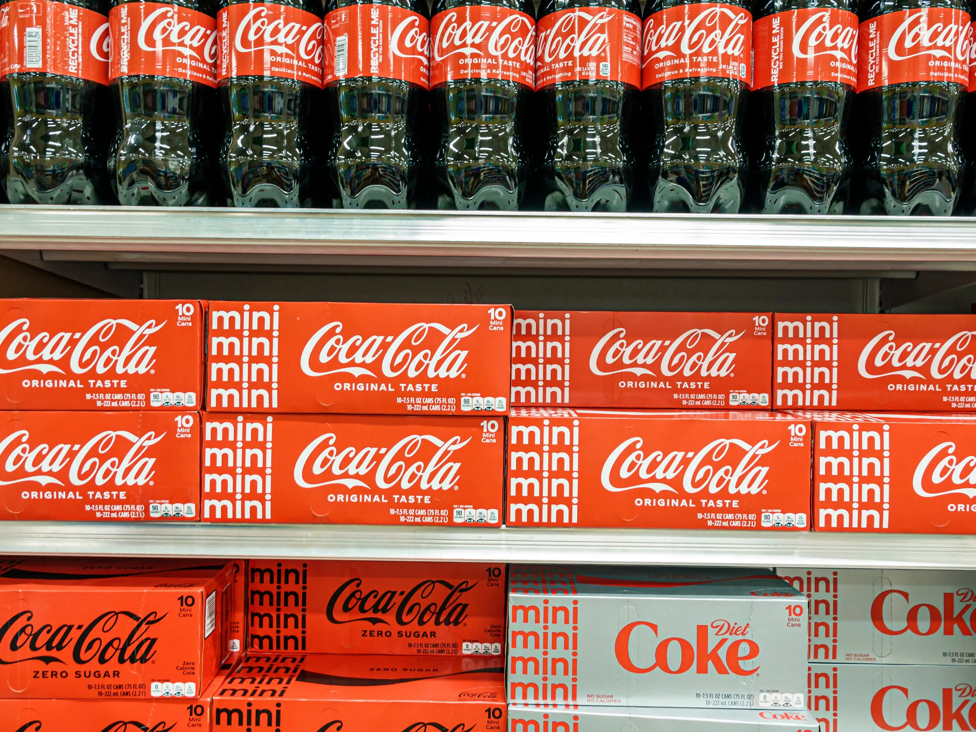 Miami Beach, Florida, Publix grocery store, Coca Cola products in mini and large sizes.