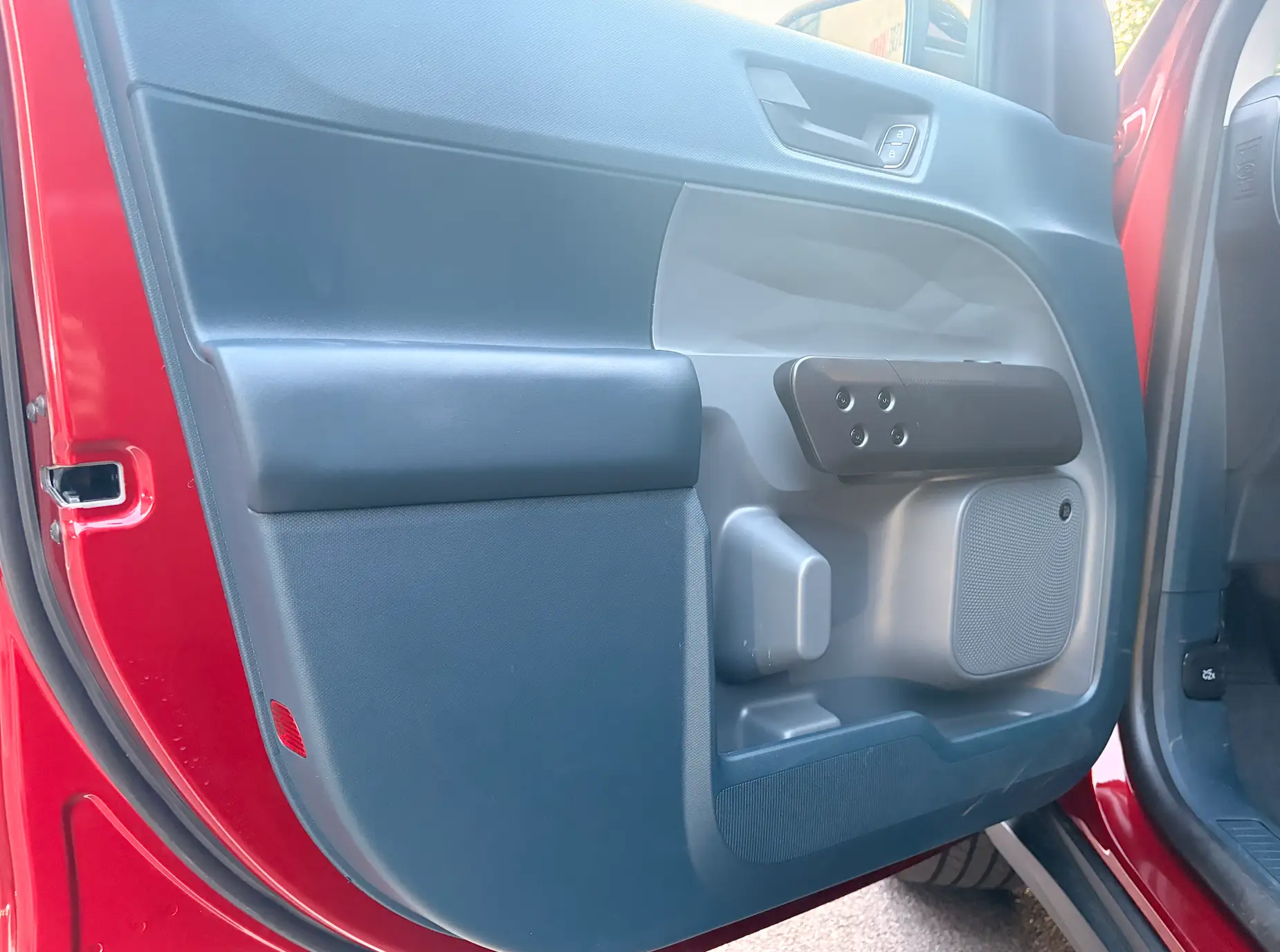 The inside of a door panel in a Ford Maverick