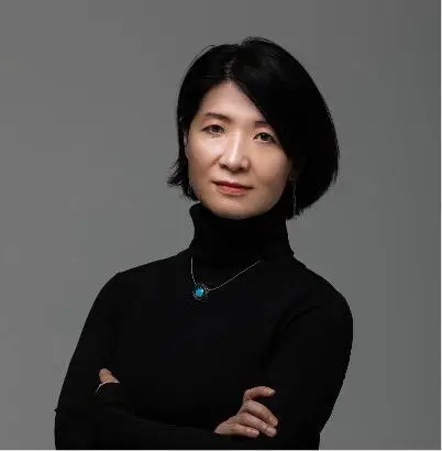 Professional headshot of Myung-hee Na in a black turtle neck.