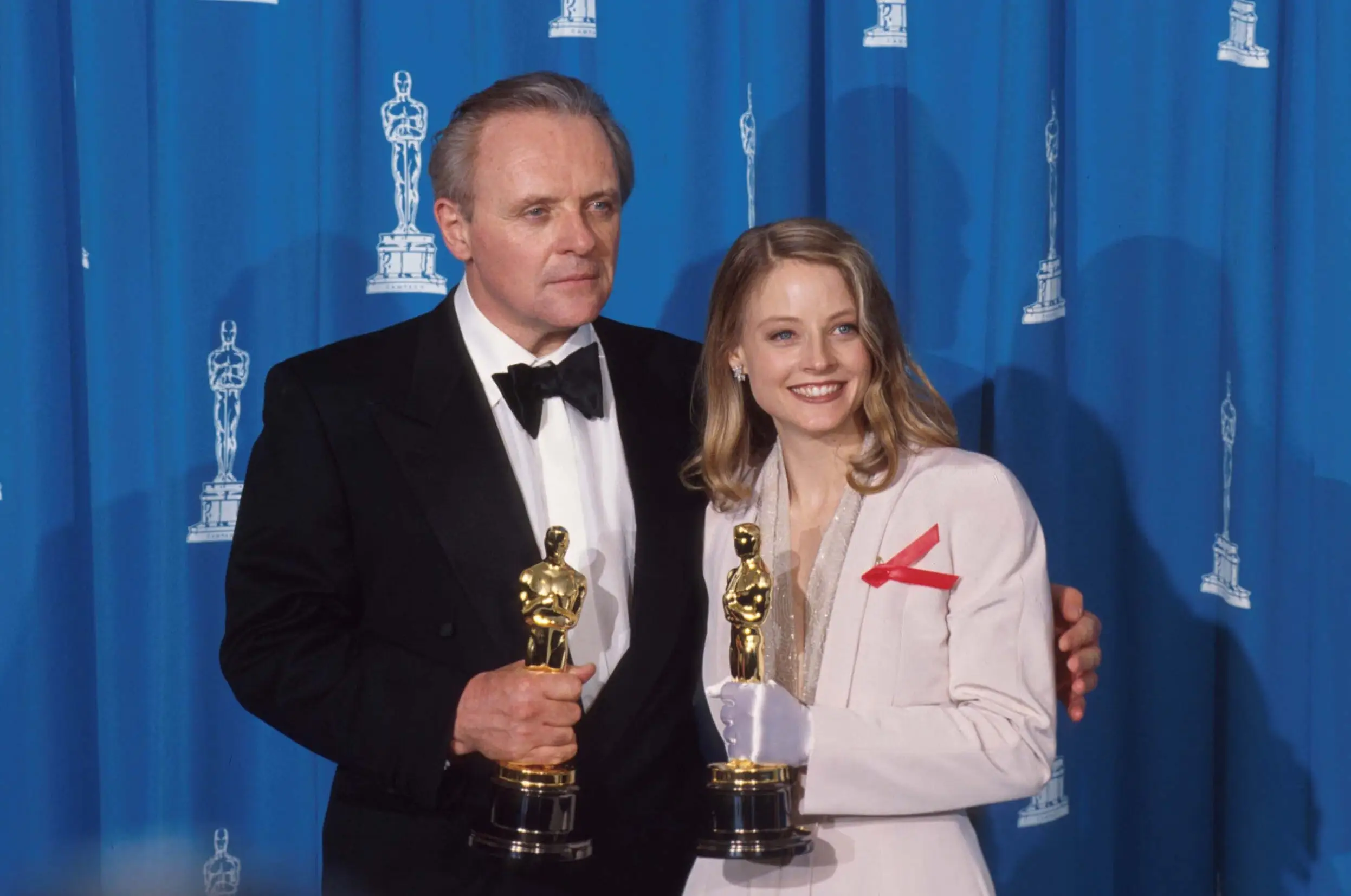 Best Actor recipient Anthony Hopkins stands with Best Actress recipient Jodie Foster at the 64th annual Academy Awards March 30, 1992 in Los Angeles, CA.