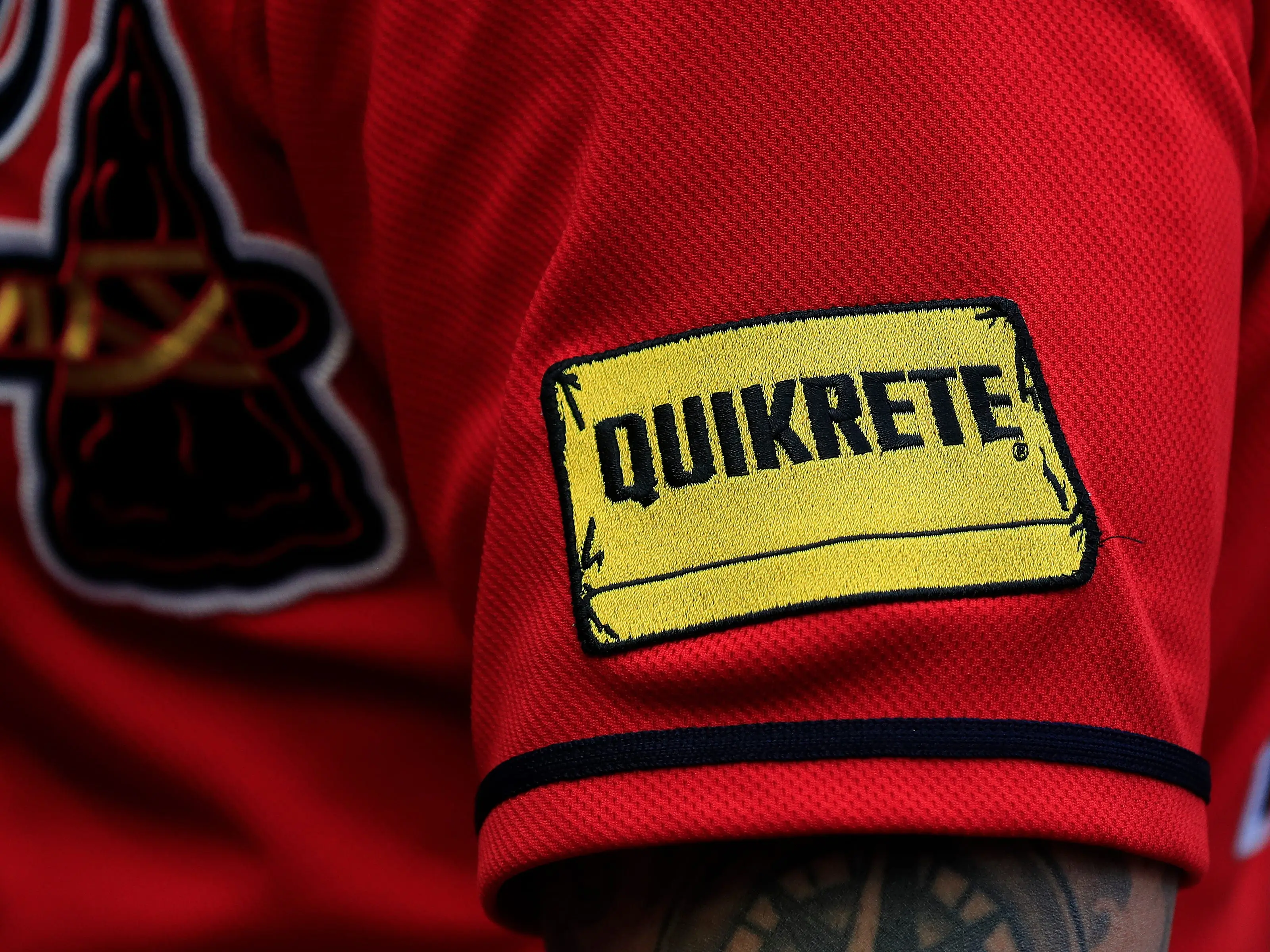 Quikrete is now on the Braves uniform as a sponsor during the Friday evening MLB interleague game between the Seattle Mariners and the Atlanta Braves on May 19, 2023 at Truist Park in Atlanta, Georgia.