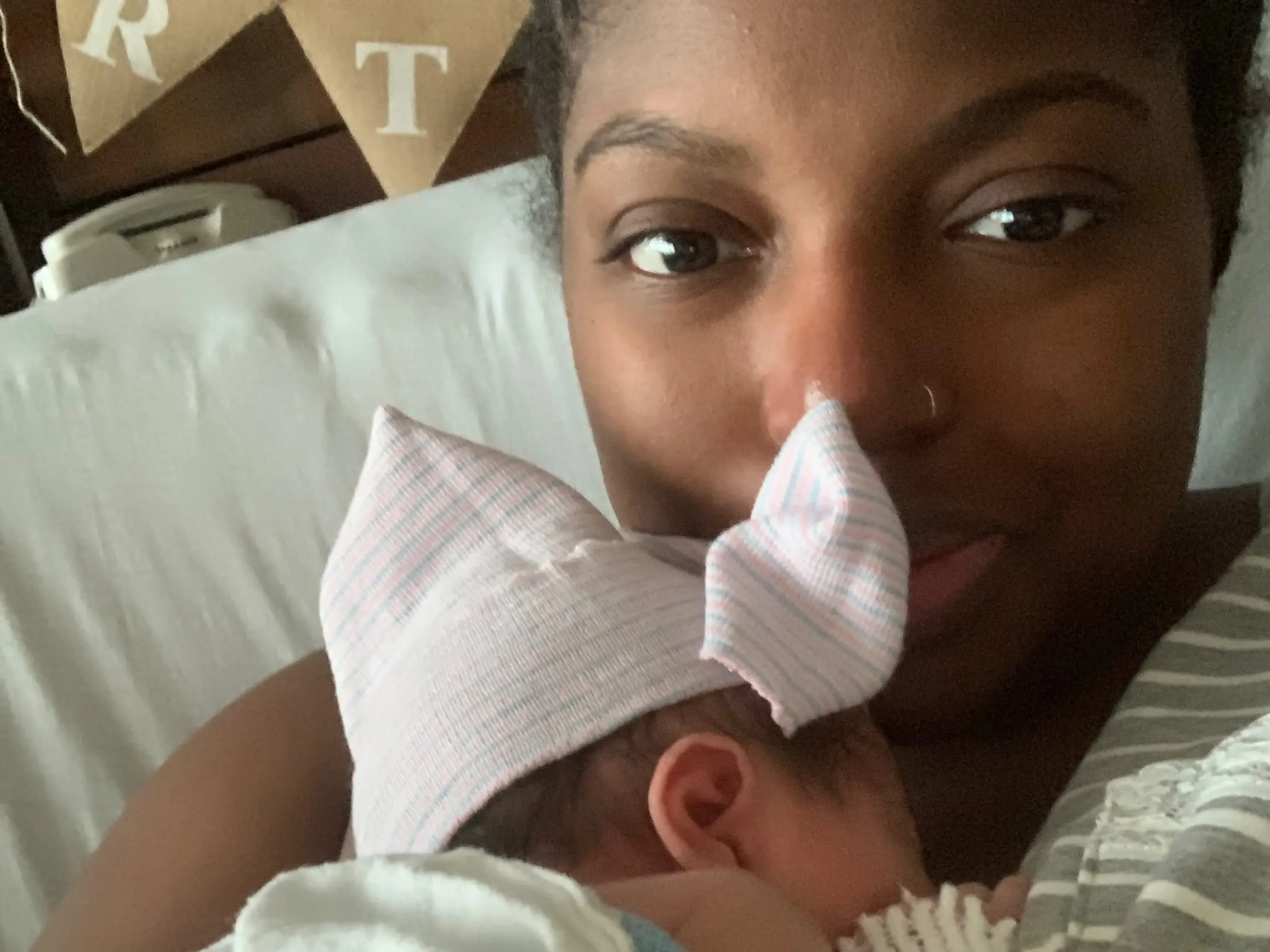 mom holding baby