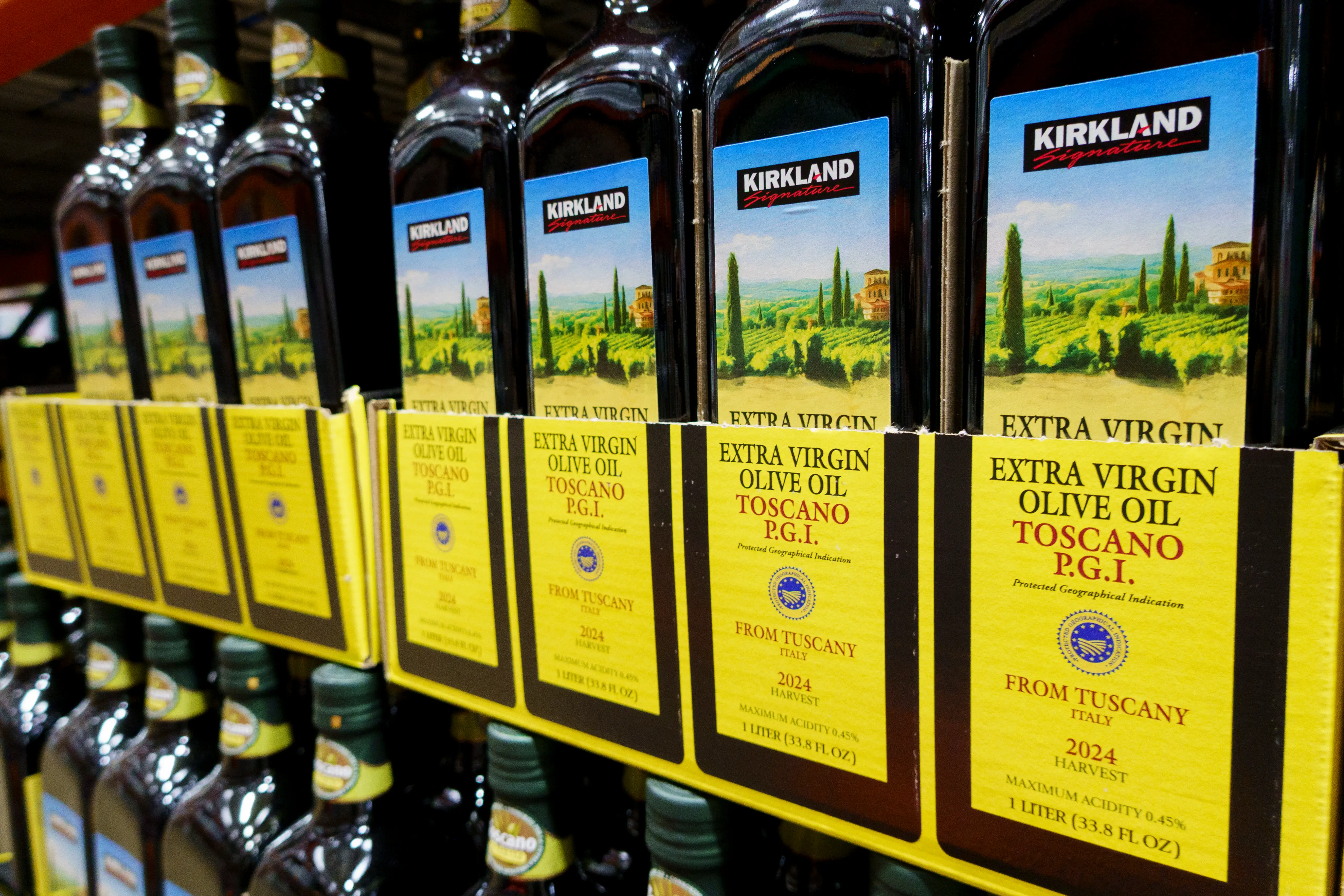 Bottles of Kirkland Signature extra virgin olive oil are displayed at a Costco Wholesale store.