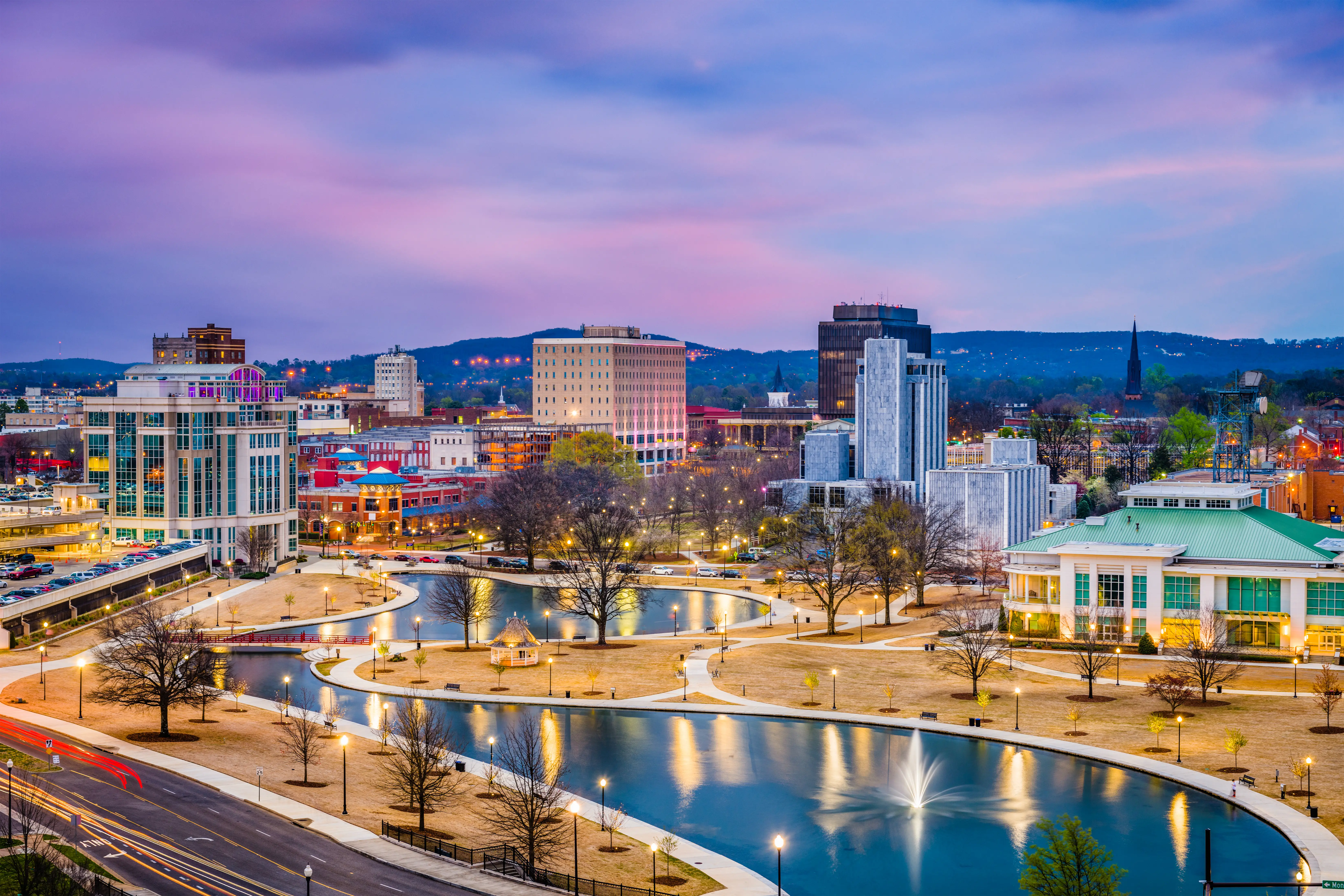 Huntsville, Alabama, park and downtown cityscape at twilight.