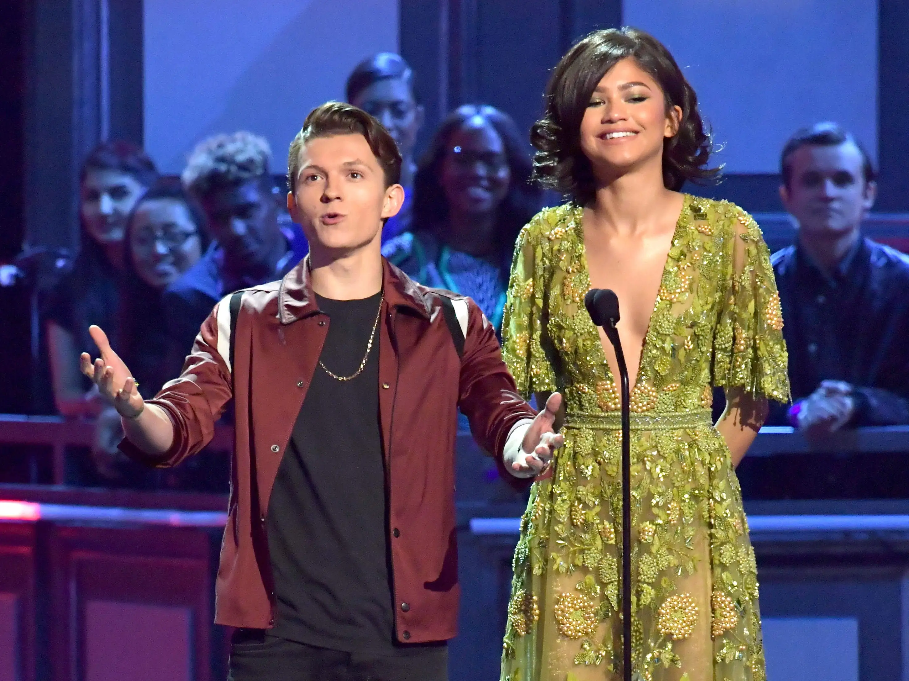 Actors Tom Holland (L) and Zendaya speak onstage during the 2017 MTV Movie And TV Awards at The Shrine Auditorium on May 7, 2017 in Los Angeles, California.