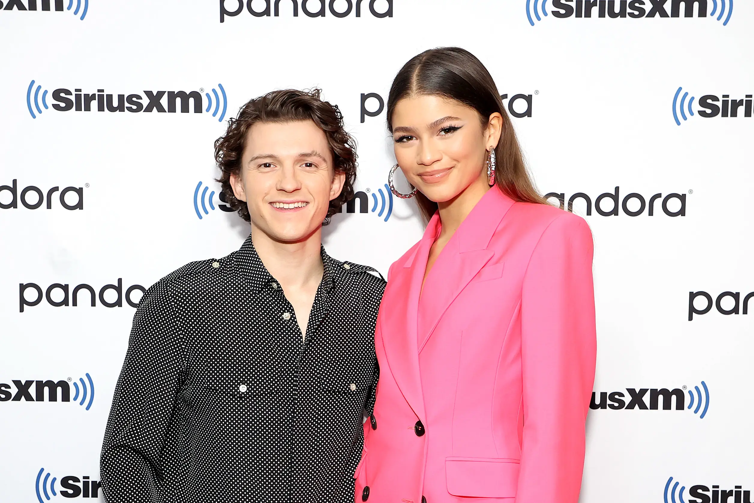 Tom Holland and Zendaya attend SiriusXM's Town Hall with the cast of Spider-Man: No Way Home on December 10, 2021 in New York City.