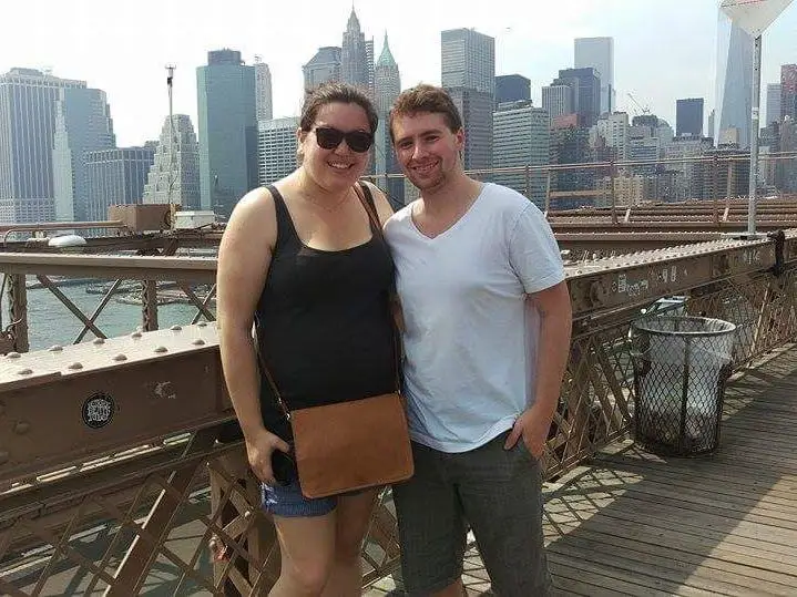 the author and her husband on the brooklyn bridge in 2015