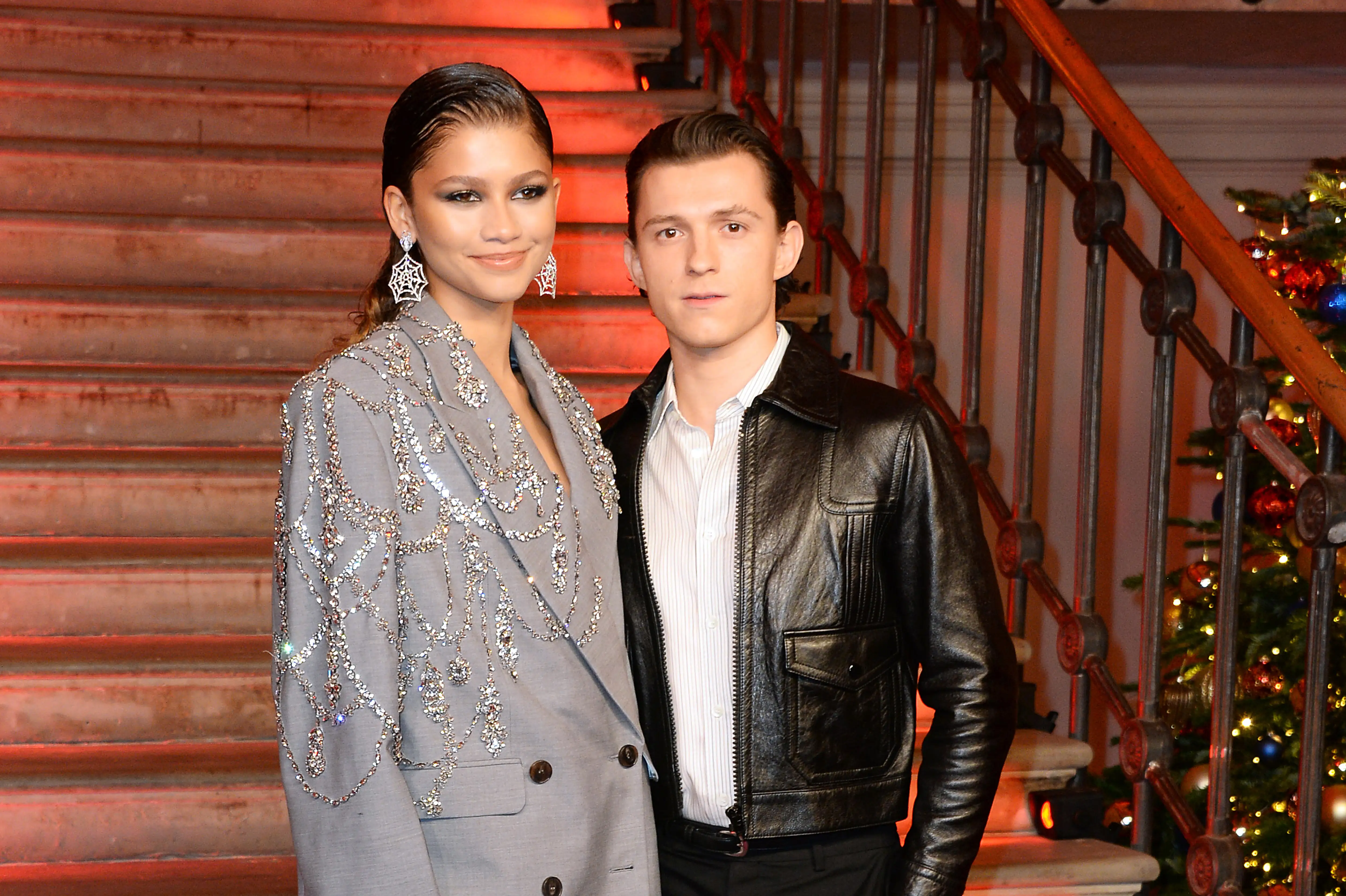 Zendaya and Tom Holland pose at a photocall for 