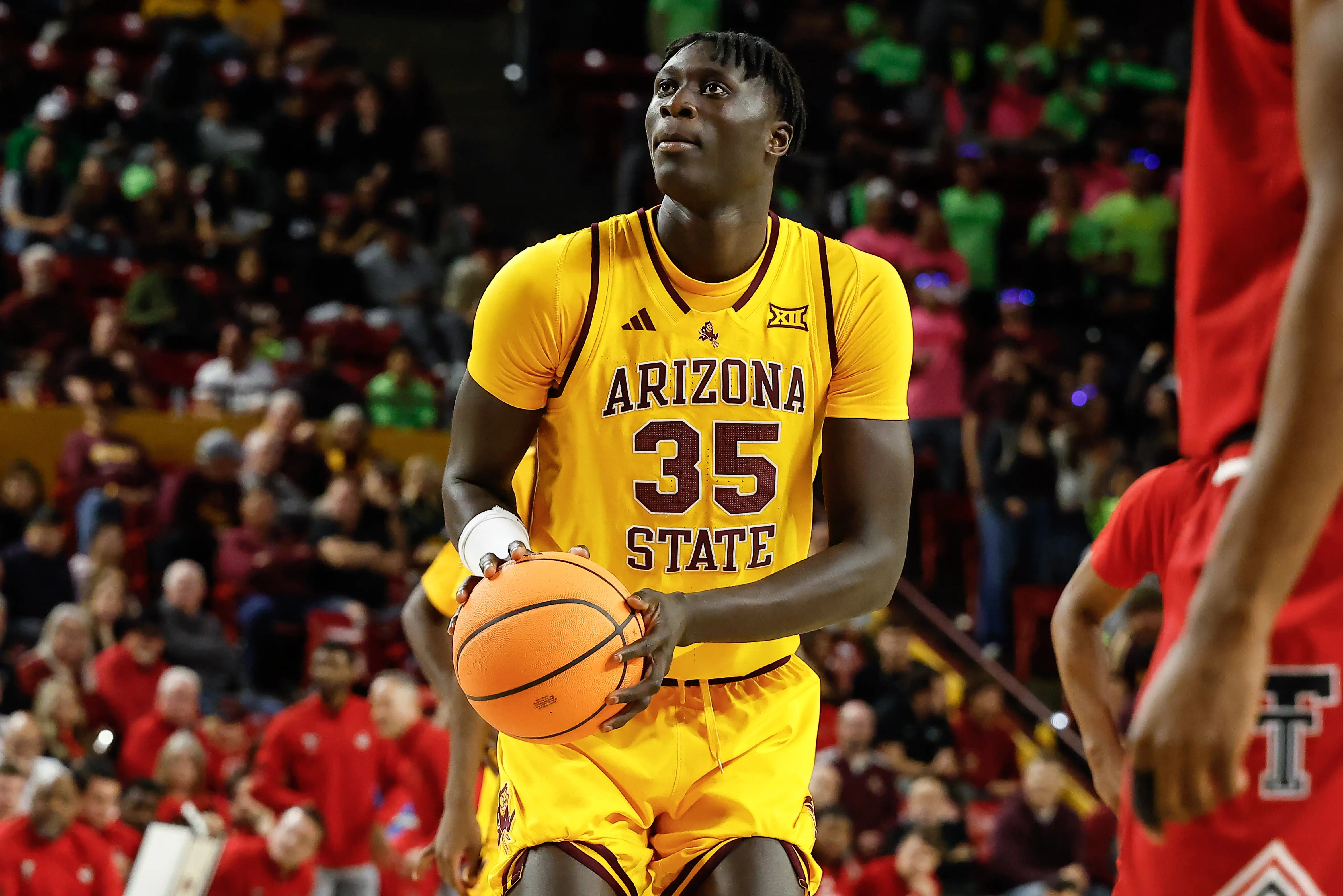 Arizona State Sun Devils center Massamba Diop (35) shoots a free throw during the college basketball game between the Texas Tech Red Raiders and the Arizona State Sun Devils.