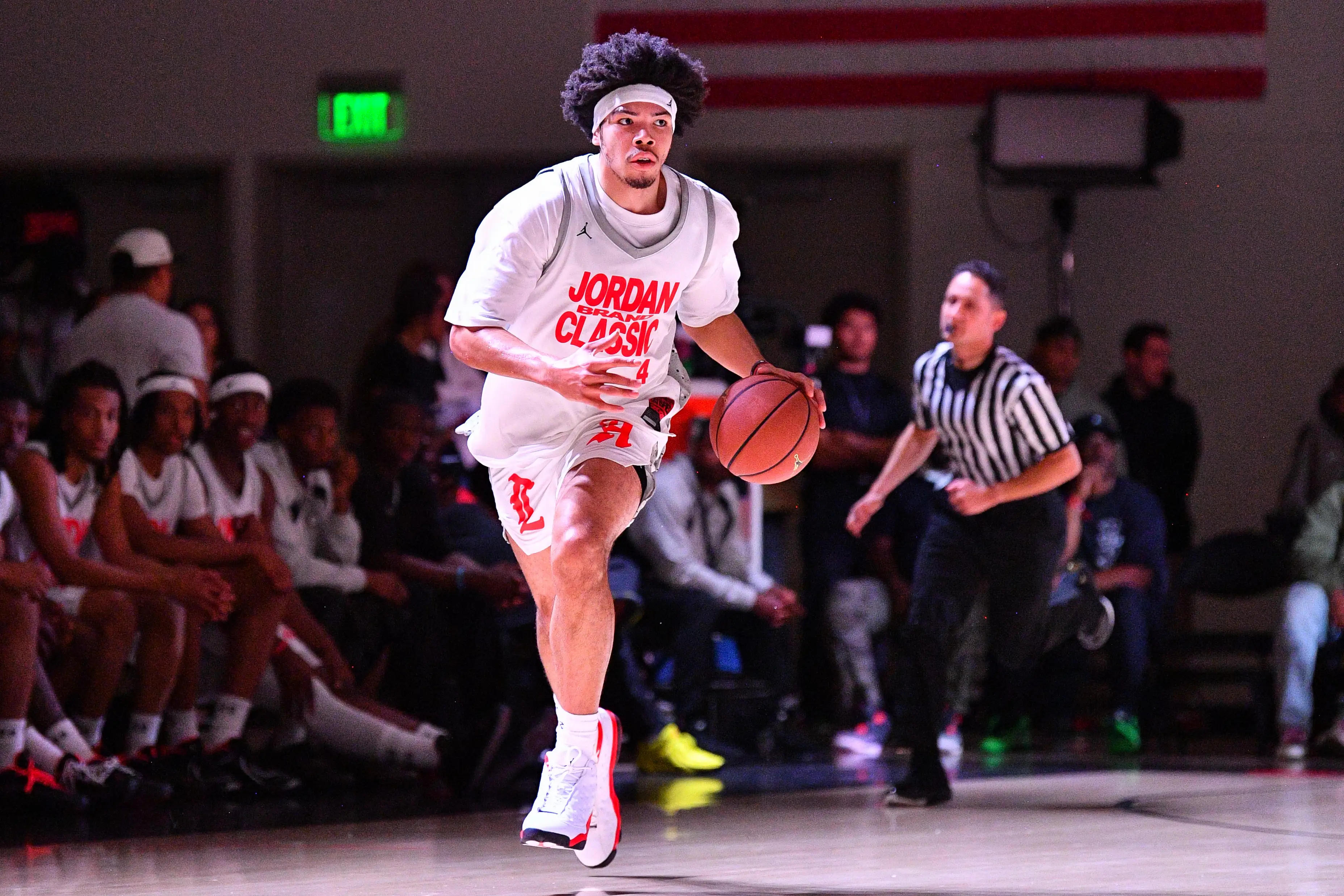 Tyran Stokes from Rainier Beach High School (WA) dribbles up the court during the Jordan Brand Classic high school basketball all-star game.